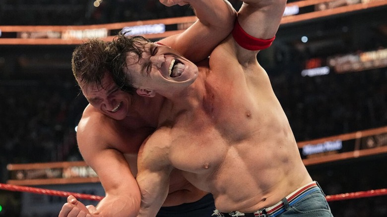 GUTHER attempts to put John Cena in a sleeper hold in the ring during Cena's last match at Saturday Night's Main Event.