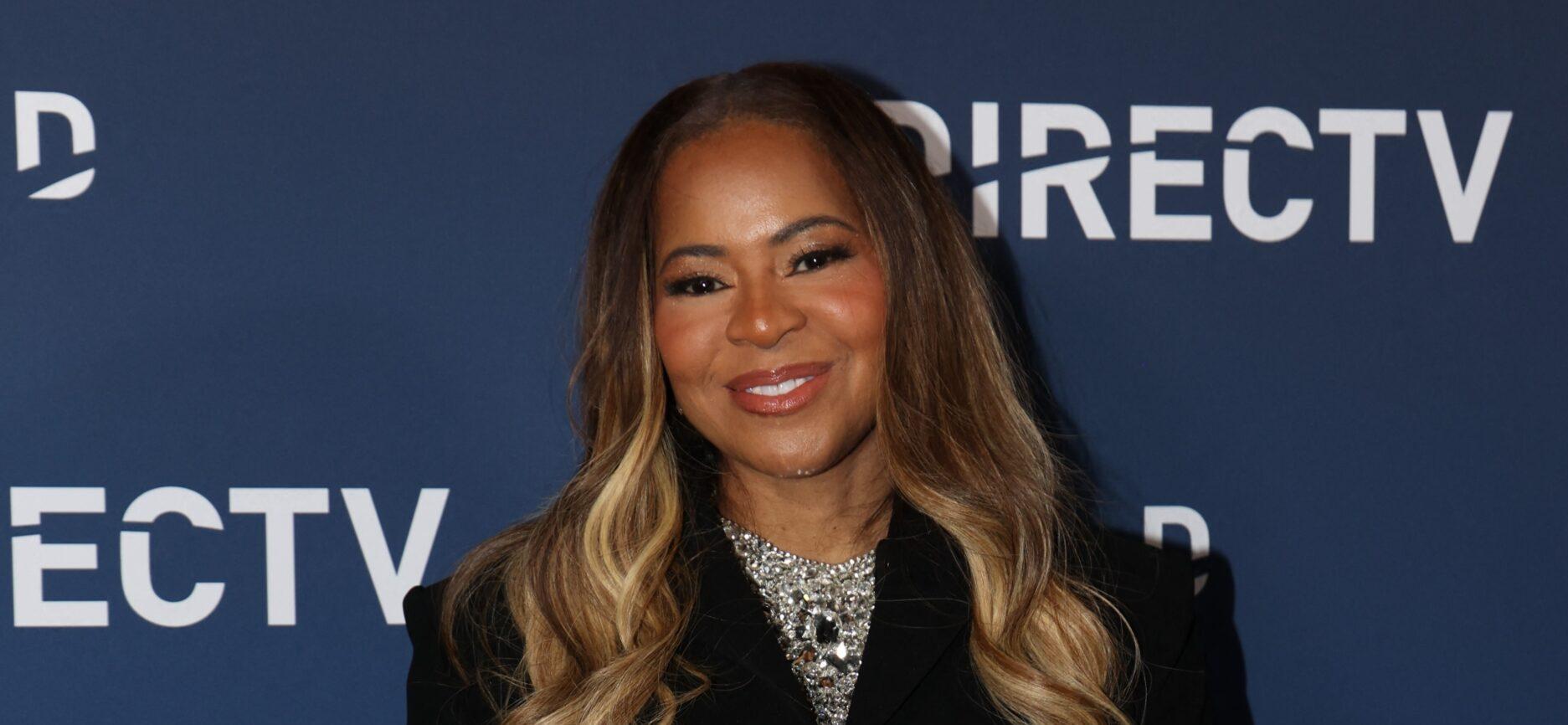 Mary Cosby posing on the red carpet.