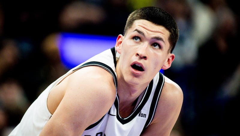 Brooklyn Nets guard Egor D&euml;min (8) looks to the basket as a Utah Jazz player takes a foul shot during an NBA game held at the Delta Center in Salt Lake City on Friday, Jan. 30, 2026.