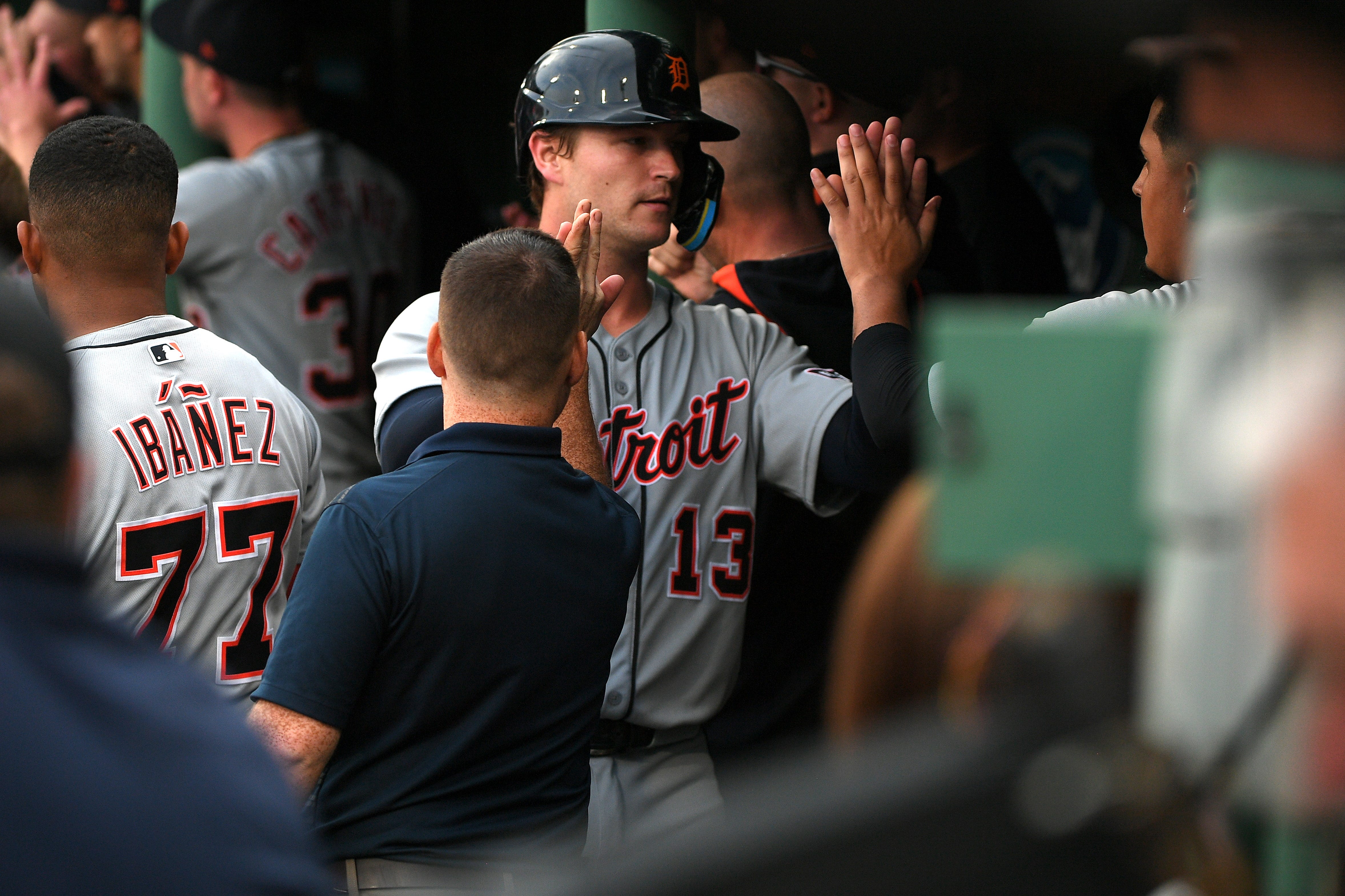Detroit Tigers catcher Dillon Dingler (13) is greeted in the dugout after scoring a run during the fifth inning against the Detroit Tigers at Fenway Park in Boston on Saturday, Sept. 27, 2025.
