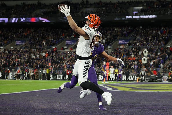 Joe Burrow took advantage of all of his offensive weapons against the Ravens, including tight end Tanner Hudson, here pulling in a spectacular touchdown catch.