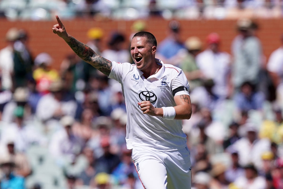 Brydon Carse celebrates taking the wicket of Australia’s Travis Head in Adelaide (Robbie Stephenson/PA) (PA Wire)