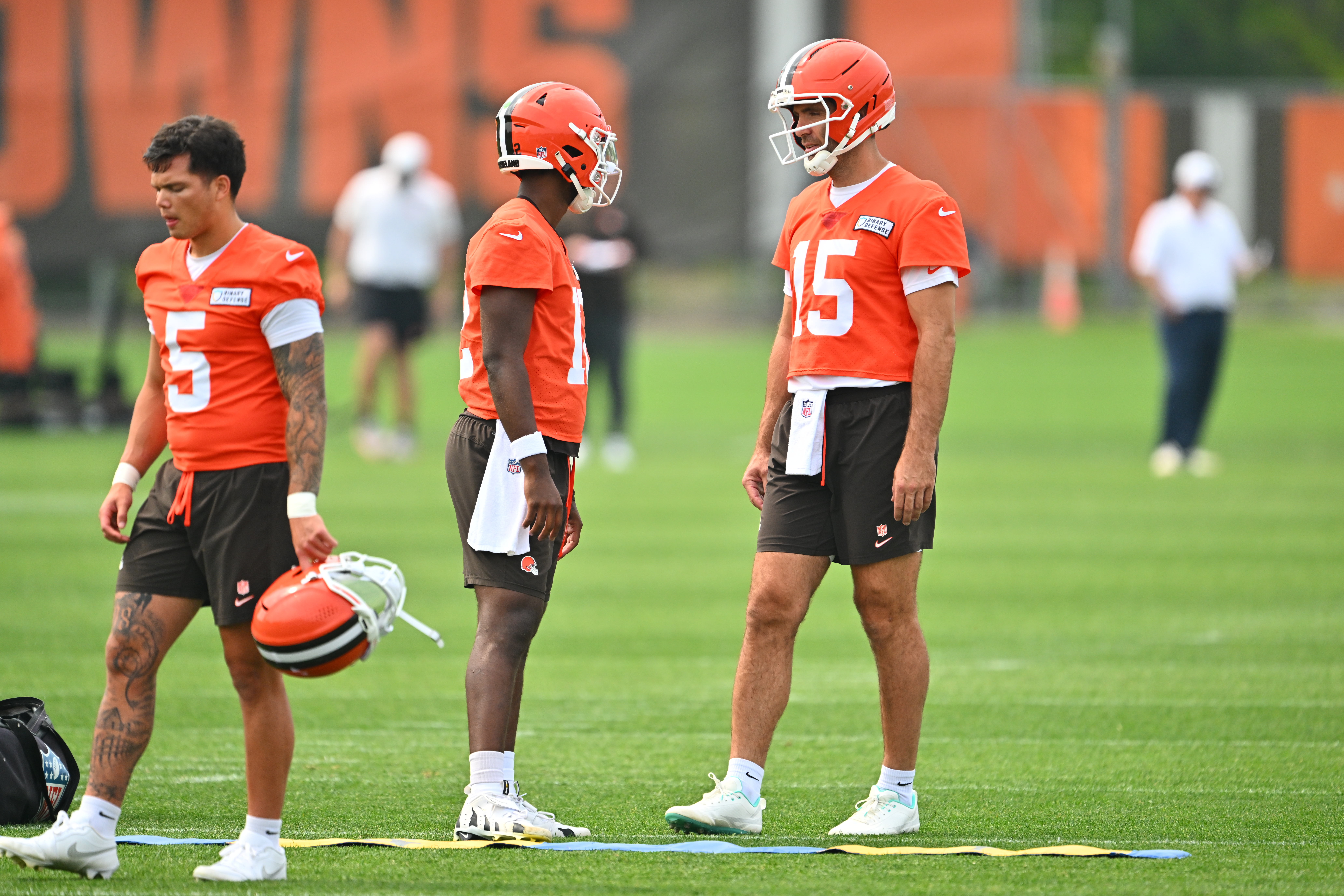 BEREA, OHIO - JUNE 12: Quarterback Shedeur Sanders #12 listens to quarterback Joe Flacco #15 of the Cleveland Browns during organized team activities at CrossCountry Mortgage Campus on June 12, 2025 in Berea, Ohio. (Photo by Jason Miller/Getty Images)