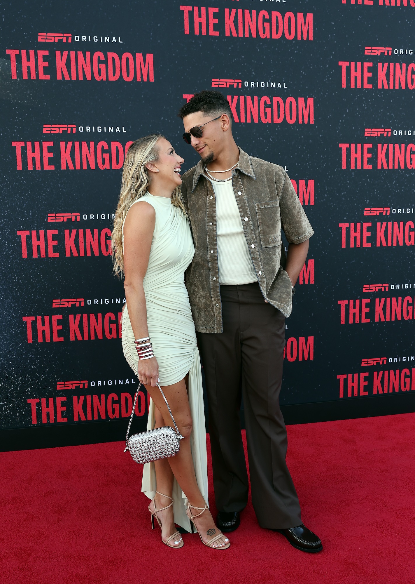 Brittany Mahomes Dazzles in Draped Dress While Supporting Husband Patrick at &lsquo;The Kingdom&rsquo; Premiere