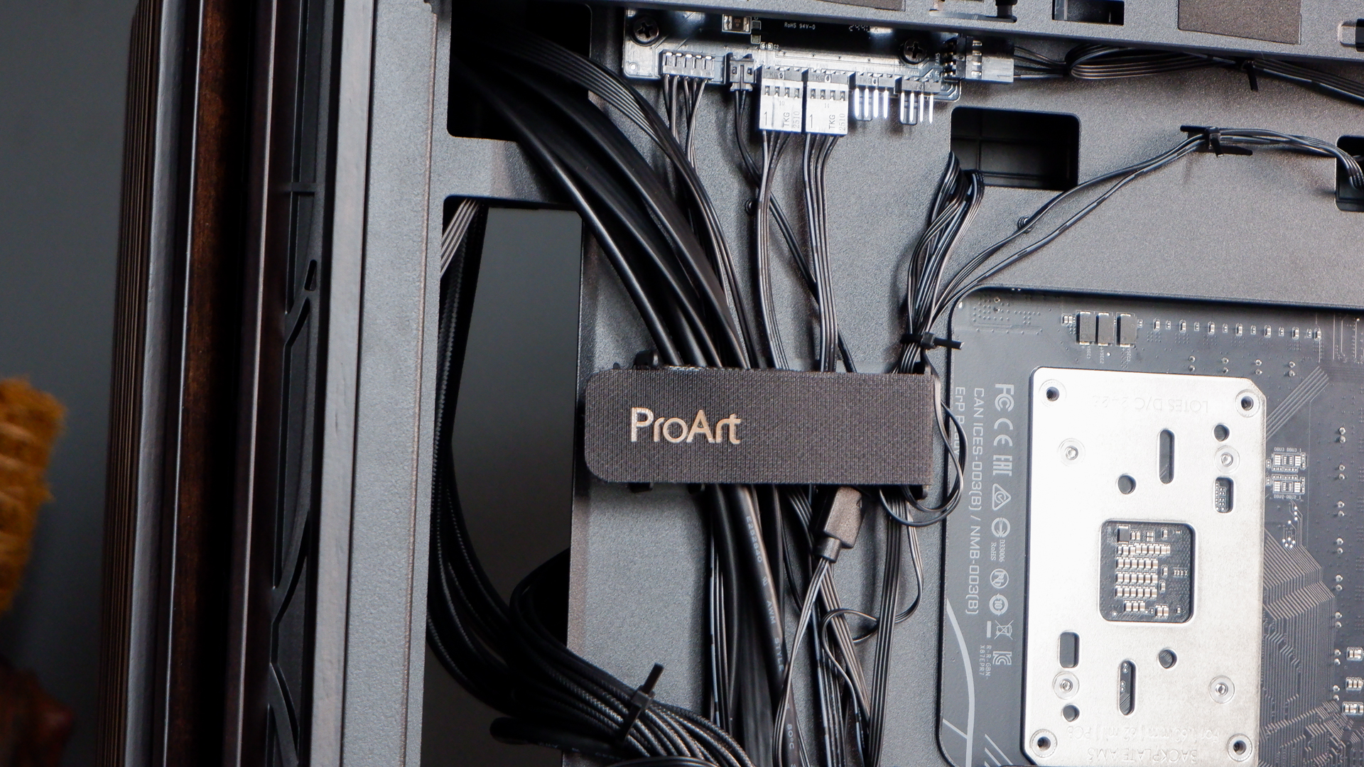 A gaming PC in the process of being built, using Radeon and Ryzen components and an Asus Pro Art PA401 PC case.