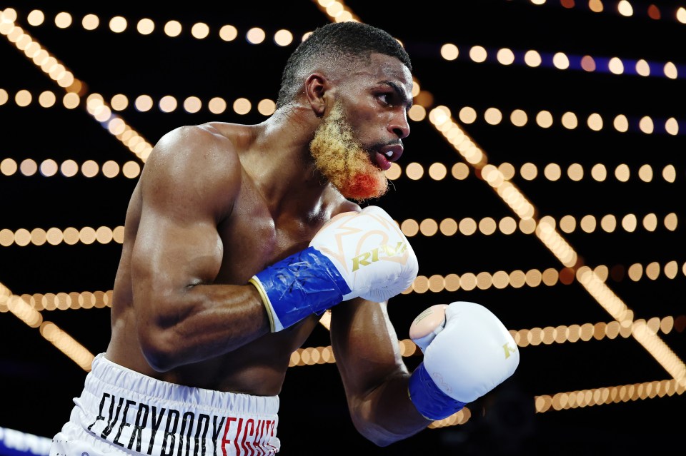 NEW YORK, NEW YORK - FEBRUARY 16: Abraham Nova looks on with blood in his beard against O’Shaquie Foster during their WBC Junior Lightweight World title fight at The Theatre at Madison Square Garden on February 16, 2024 in New York City. (Photo by Al Bello/Getty Images)