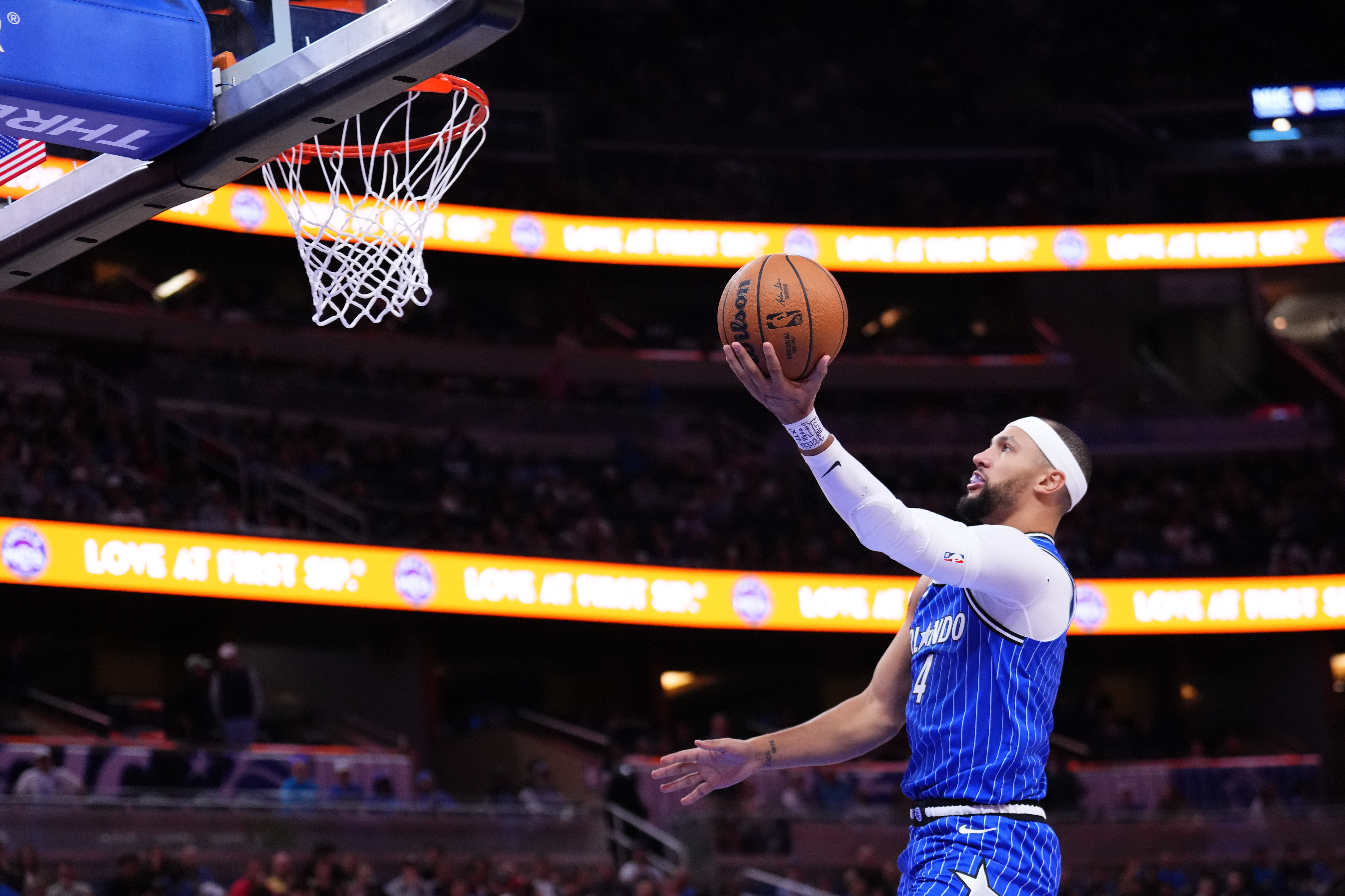 ORLANDO, FLORIDA - DECEMBER 05: Jalen Suggs #4 of the Orlando Magic goes up for a shot against the Miami Heat during the third quarter at Kia Center on December 05, 2025 in Orlando, Florida. NOTE TO USER: User expressly acknowledges and agrees that, by downloading and/or using this photograph, user is consenting to the terms and conditions of the Getty Images License Agreement. (Photo by Rich Storry/Getty Images)