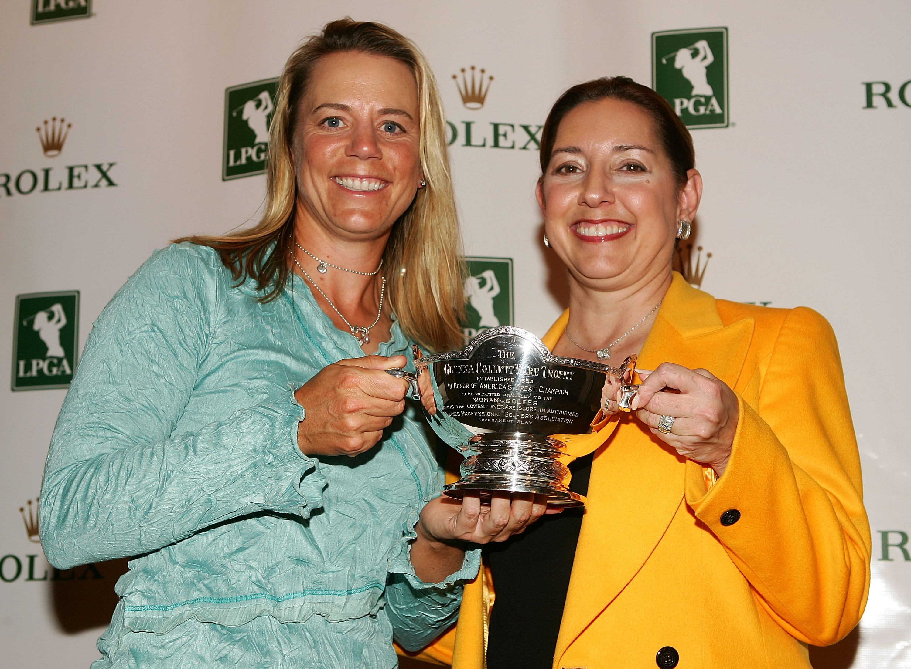 Annika Sorenstam (L) of Sweden is presented the 2005 LPGA Vare Trophy by LPGA Commissioner Carolyn Bivins during the 2005 LPGA awards reception at the Mar-a-Lago Club on November 18, 2005 in West Palm Beach, Florida.