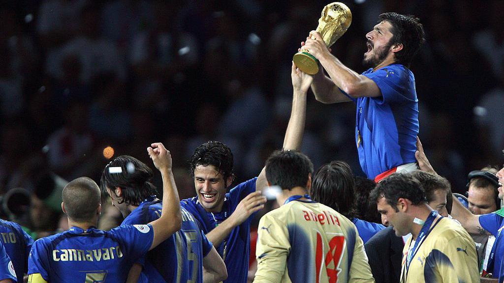 Gennaro Gattuso holding the World Cup trophy