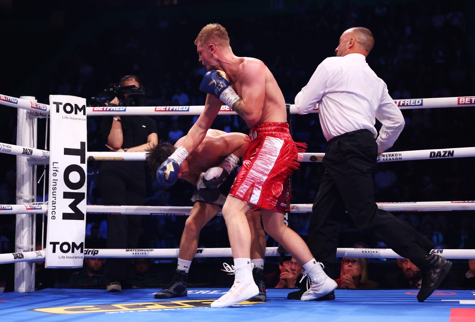 MANCHESTER, ENGLAND - JULY 05: Referee John Latham reacts as Fraser Wilkinson punches William Crolla, before stopping the bout during their Super Welterweight fight on 'The Warrior Code' fight card at AO Arena on July 05, 2025 in Manchester, England. (Photo by Alex Livesey/Getty Images)