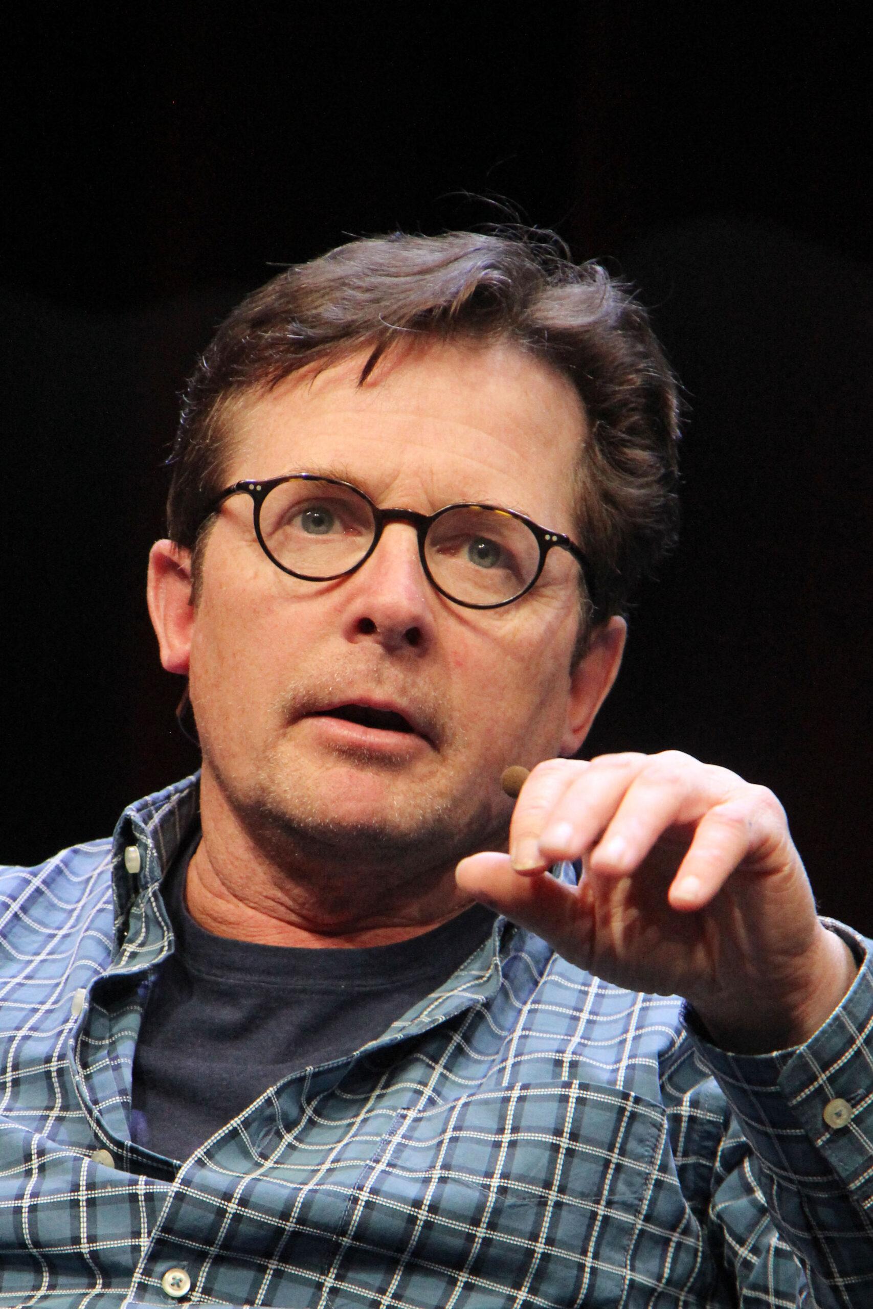 Michael J Fox speaking at event