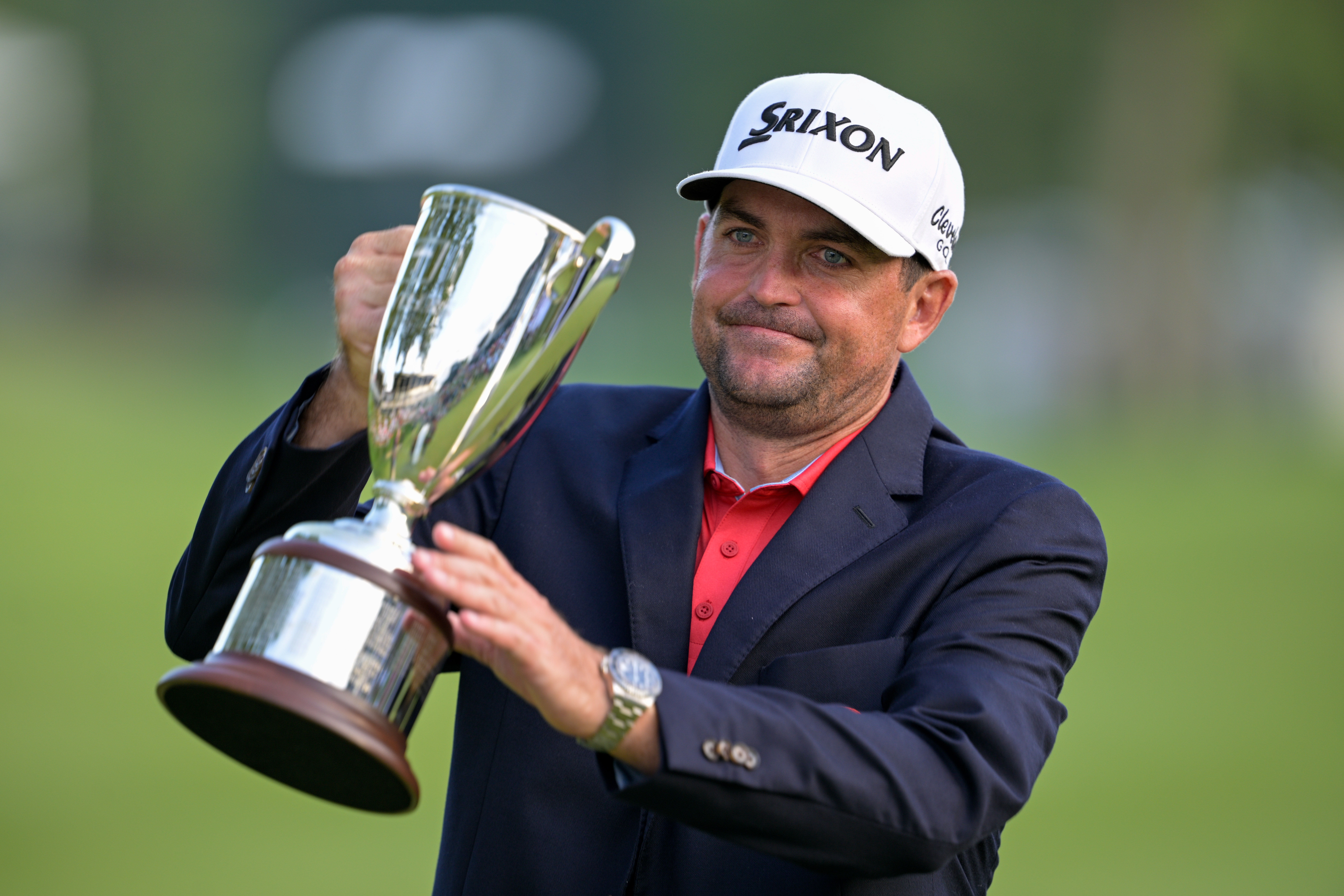 CROMWELL, CONNECTICUT - JUNE 22: Keegan Bradley of the United States celebrates with the trophy after winning the Travelers Championship 2025 at TPC River Highlands on June 22, 2025 in Cromwell, Connecticut. (Photo by Mark Smith/ISI Photos/ISI Photos via Getty Images)