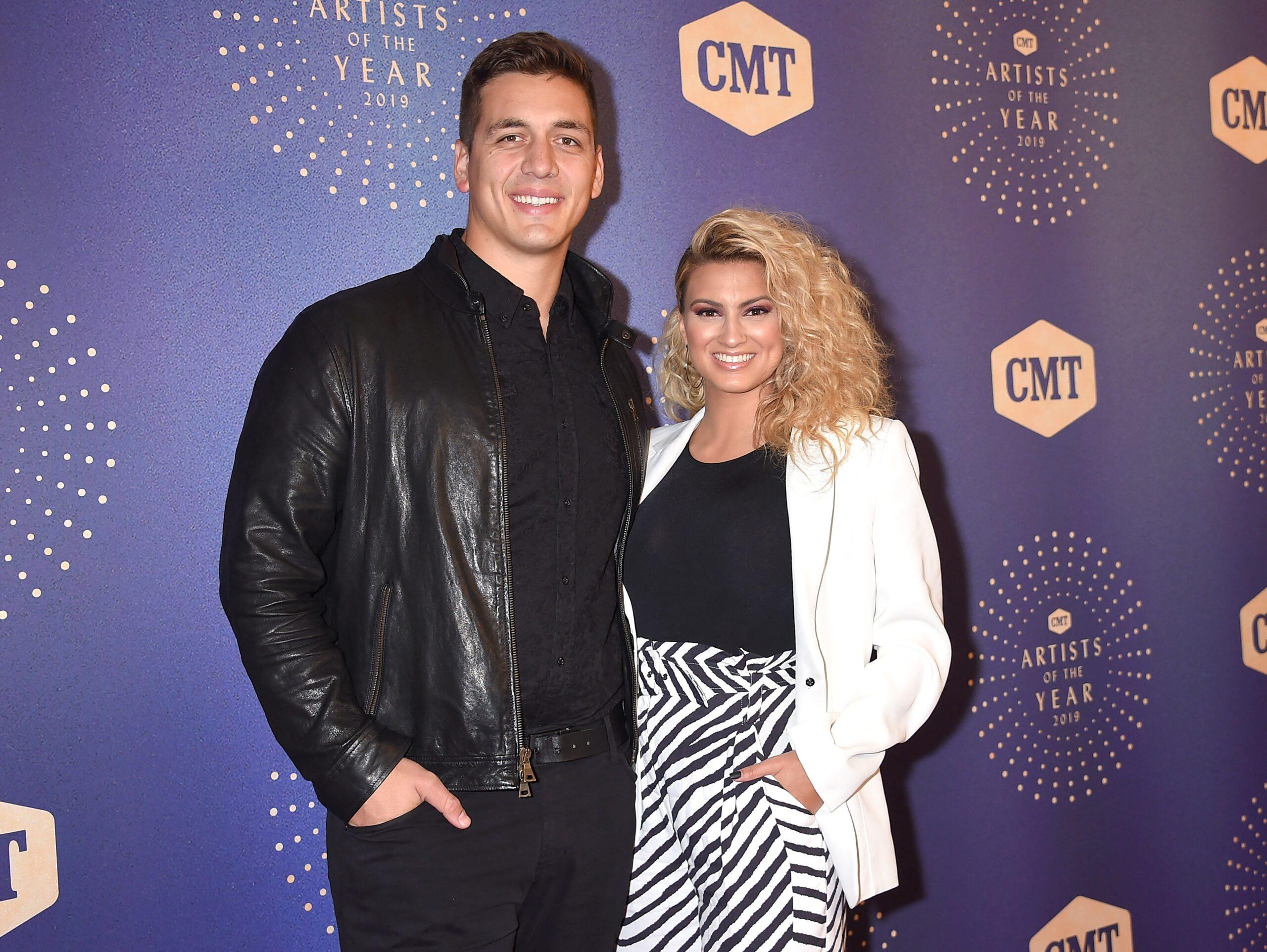 Tori Kelly and Andr&eacute; Murillo on the red carpet at the 2019 CMT Artists of the Year