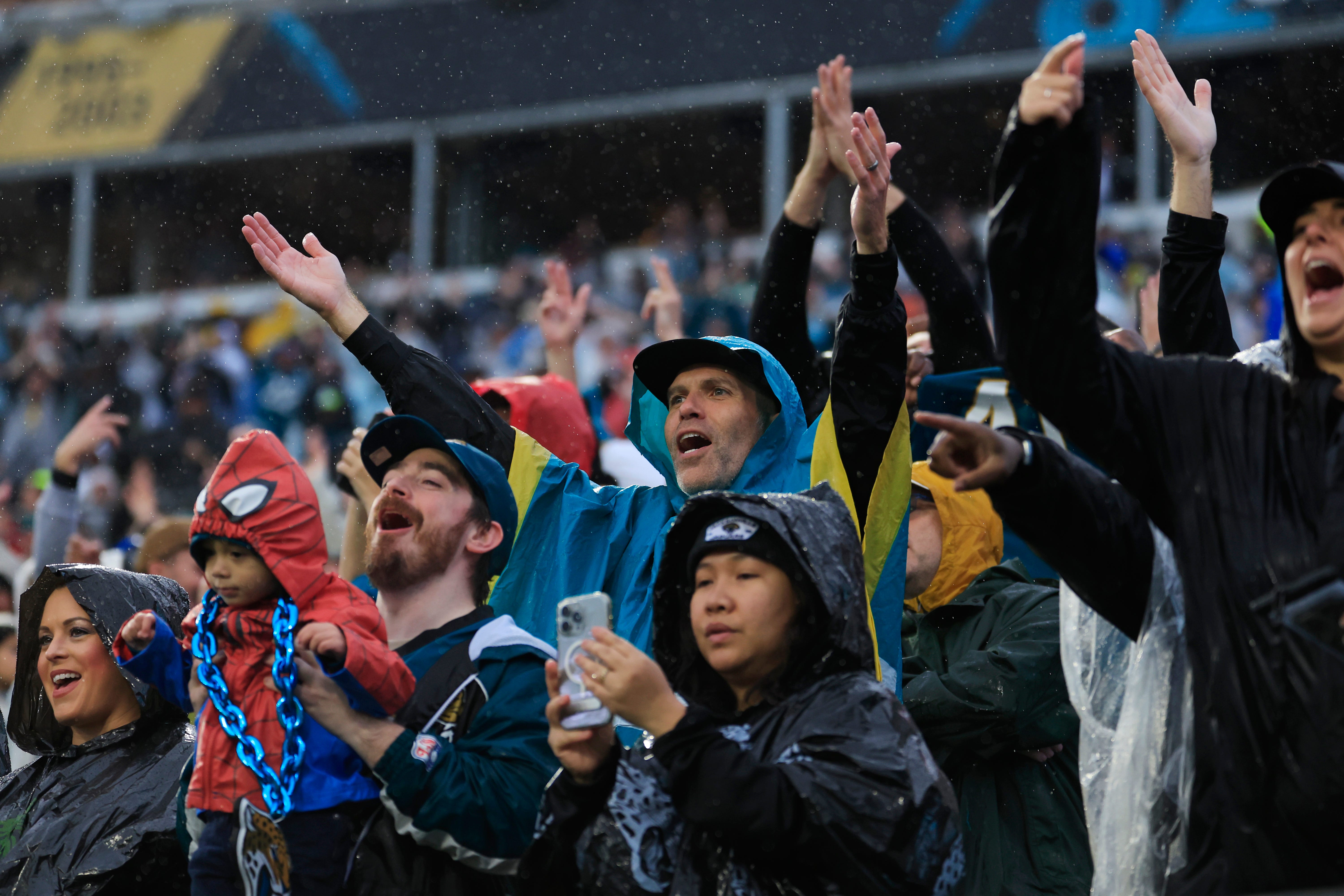 Jacksonville Jaguars fans cheer during the fourth quarter of an NFL football game at EverBank Stadium, Sunday, Dec. 7, 2025, in Jacksonville, Fla. The Jaguars defeated the Colts 36-19. [Corey Perrine/Florida Times-Union]