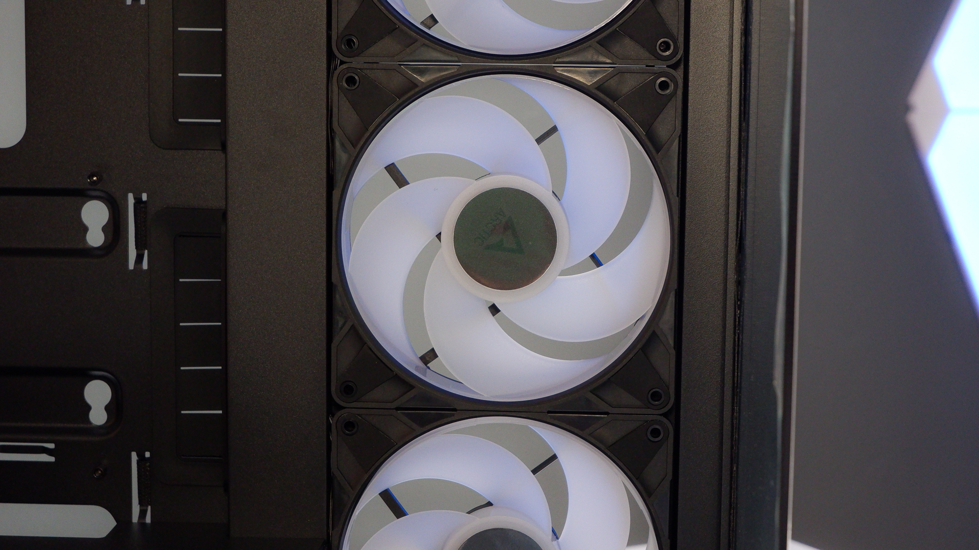 Arctic's Xtender PC case on a white desk with various parts being installed to build a functional gaming PC.