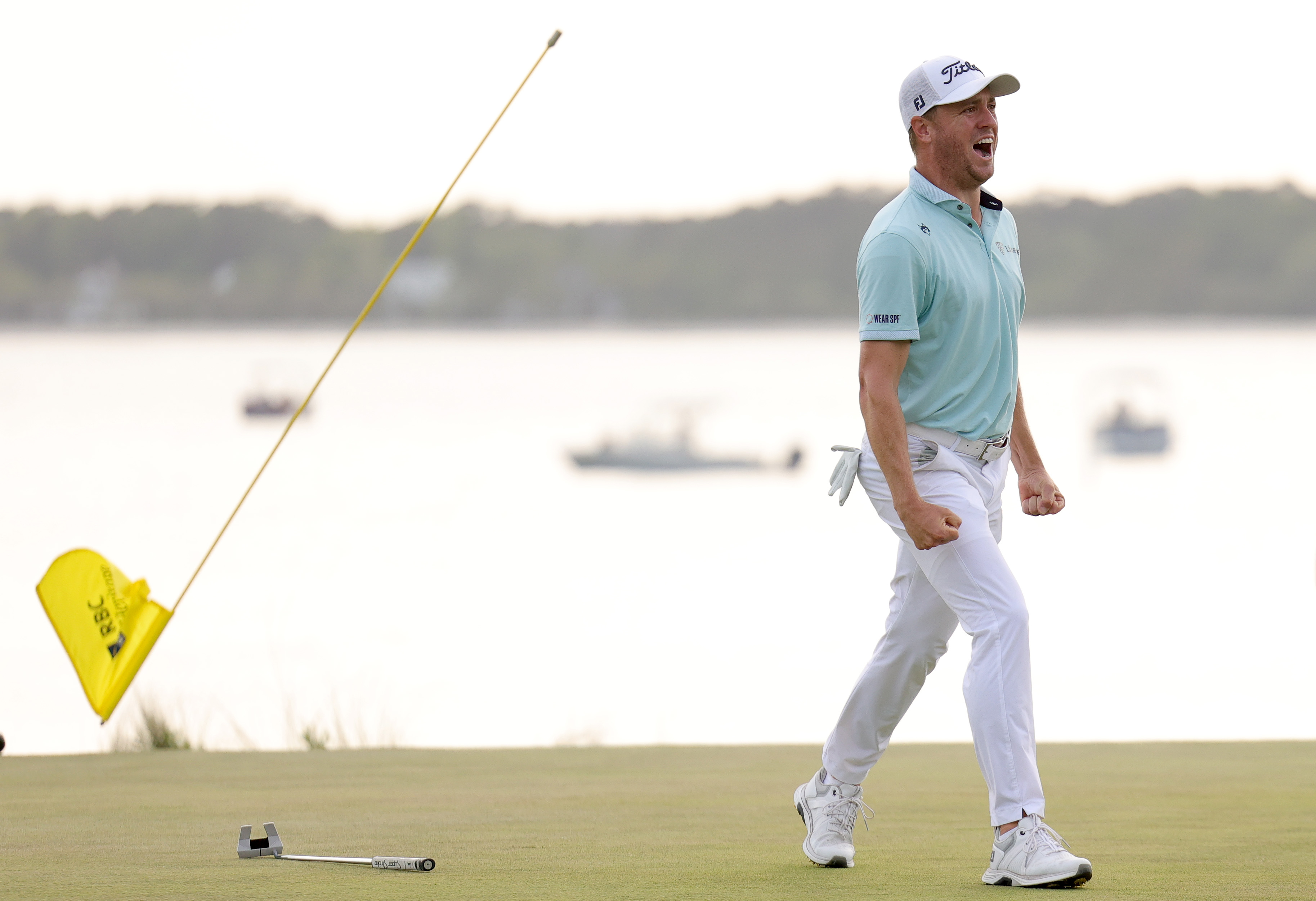 HILTON HEAD ISLAND, SOUTH CAROLINA - APRIL 20: Justin Thomas of the United States celebrates on the 18th green during the first playoff hole after winning the final round of the RBC Heritage 2025 at Harbour Town Golf Links on April 20, 2025 in Hilton Head Island, South Carolina. (Photo by Andrew Redington/Getty Images)