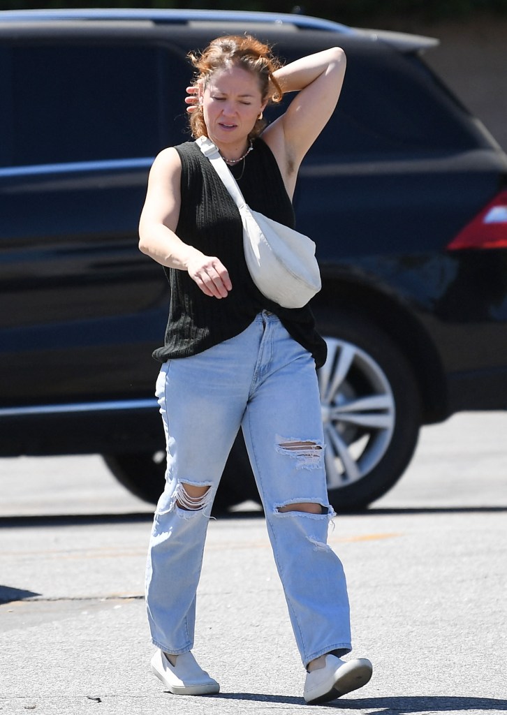 EXCLUSIVE: *NO WEB UNTIL 945PM EDT 15TH JULY* Erika Christensen favors the natural look as she steps out flaunting unshaven armpits 25 years after her breakout role in 'Traffic'