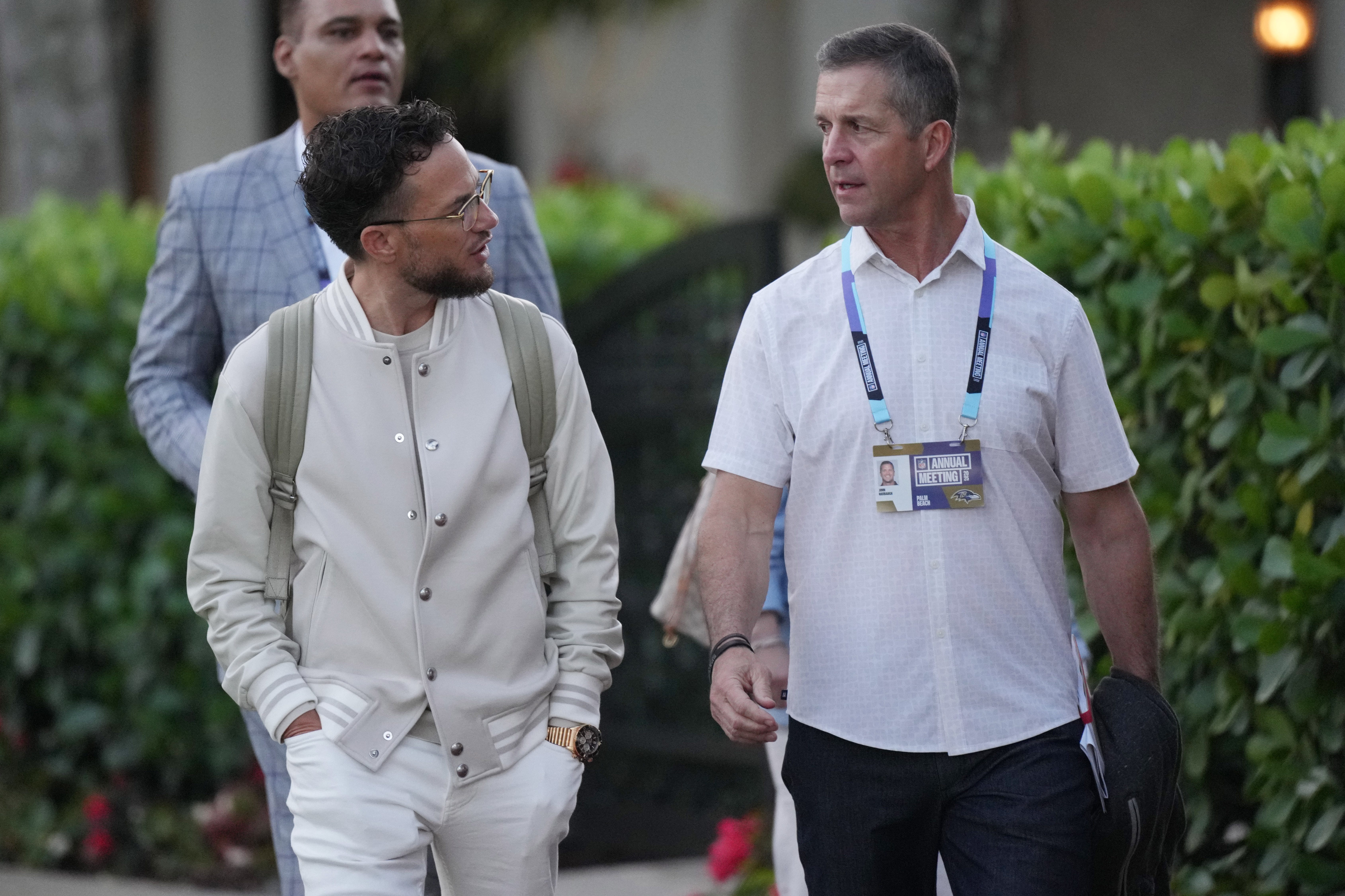 Mar 31, 2025; Palm Beach, FL, USA; Miami Dolphins head coach Mike McDaniel, left, and Baltimore Ravens head coach John Harbaugh attend the NFL Annual League Meeting at The Breakers. Mandatory Credit: Jim Rassol-Imagn Images