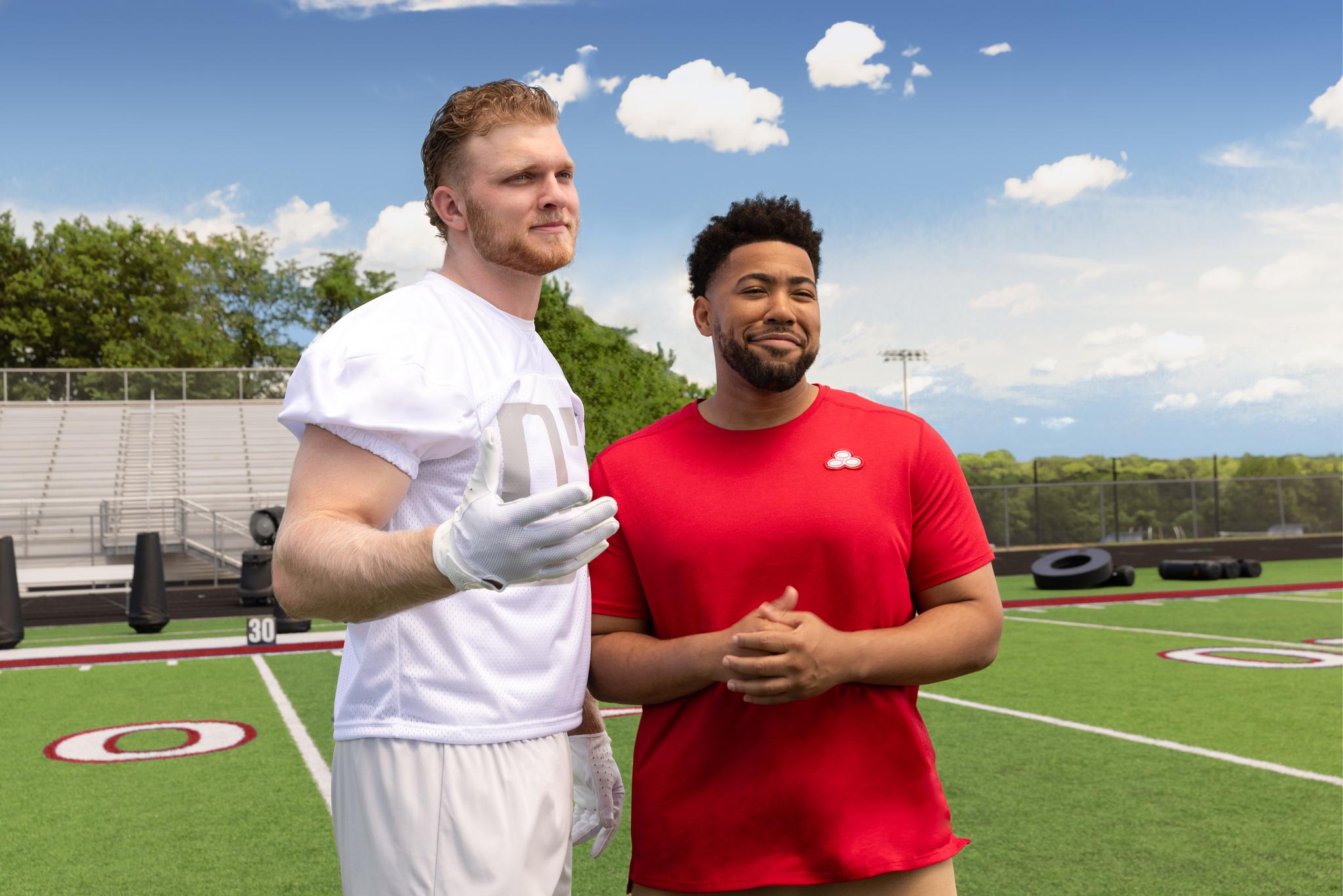 Aidan Hutchinson with "Jake from State Farm." 