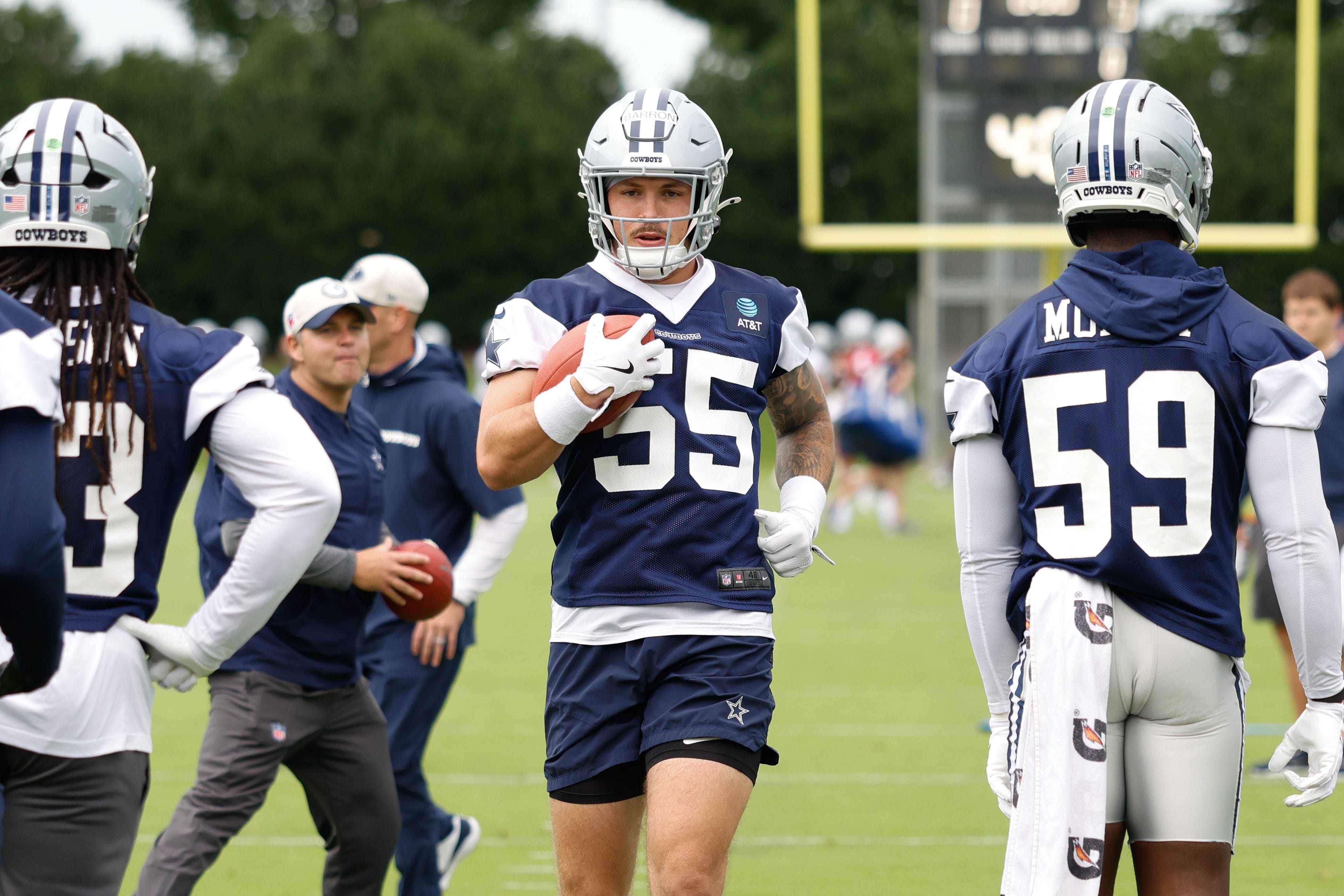 Jun 10, 2025; Arlington, TX, USA; Dallas Cowboys linebacker Justin Barron (55) goes through a drill during practice at the Ford Center at the Star Training Facility in Frisco, Texas. Mandatory Credit: Chris Jones-Imagn Images