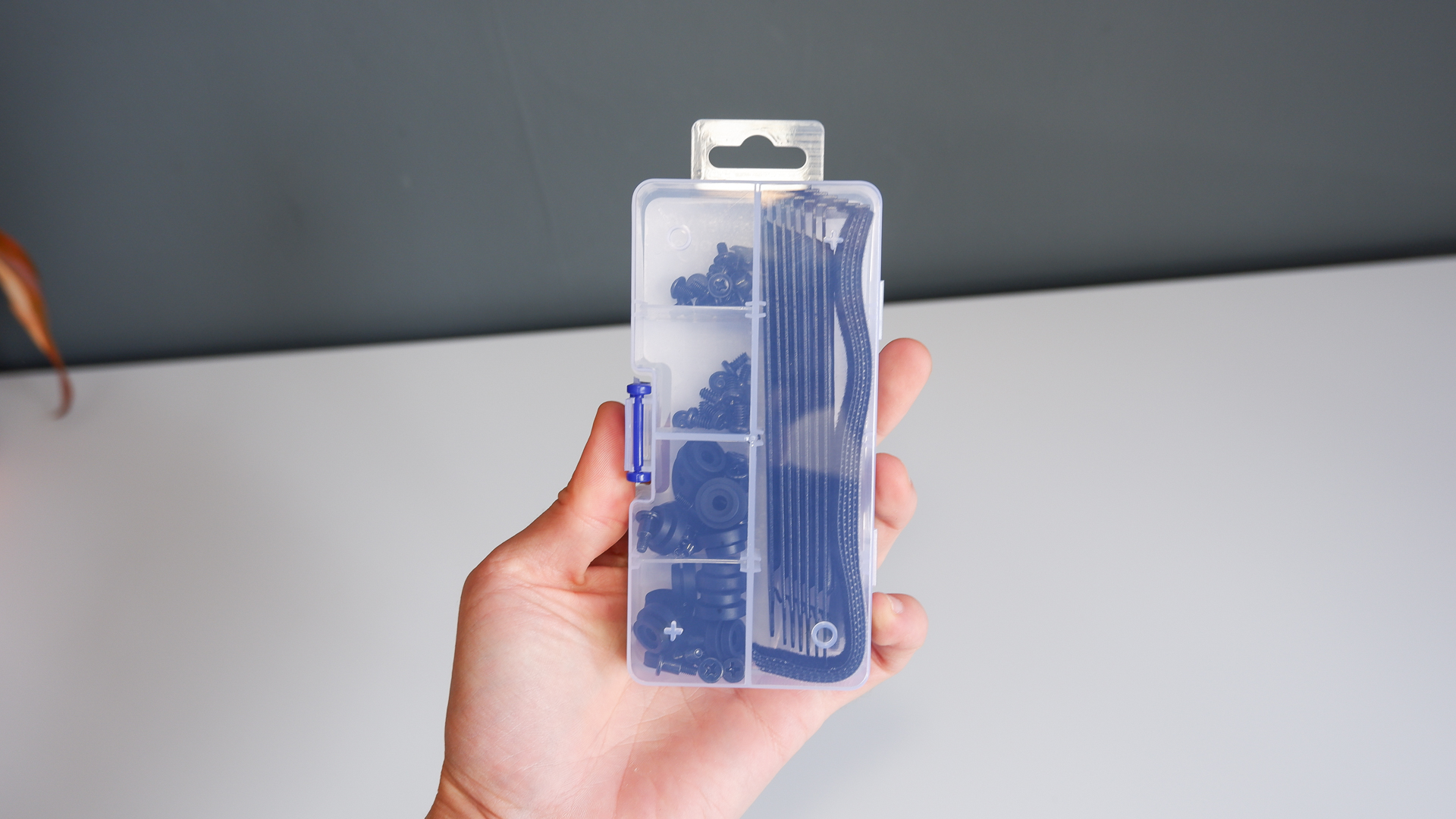 Arctic's Xtender PC case on a white desk with various parts being installed to build a functional gaming PC.