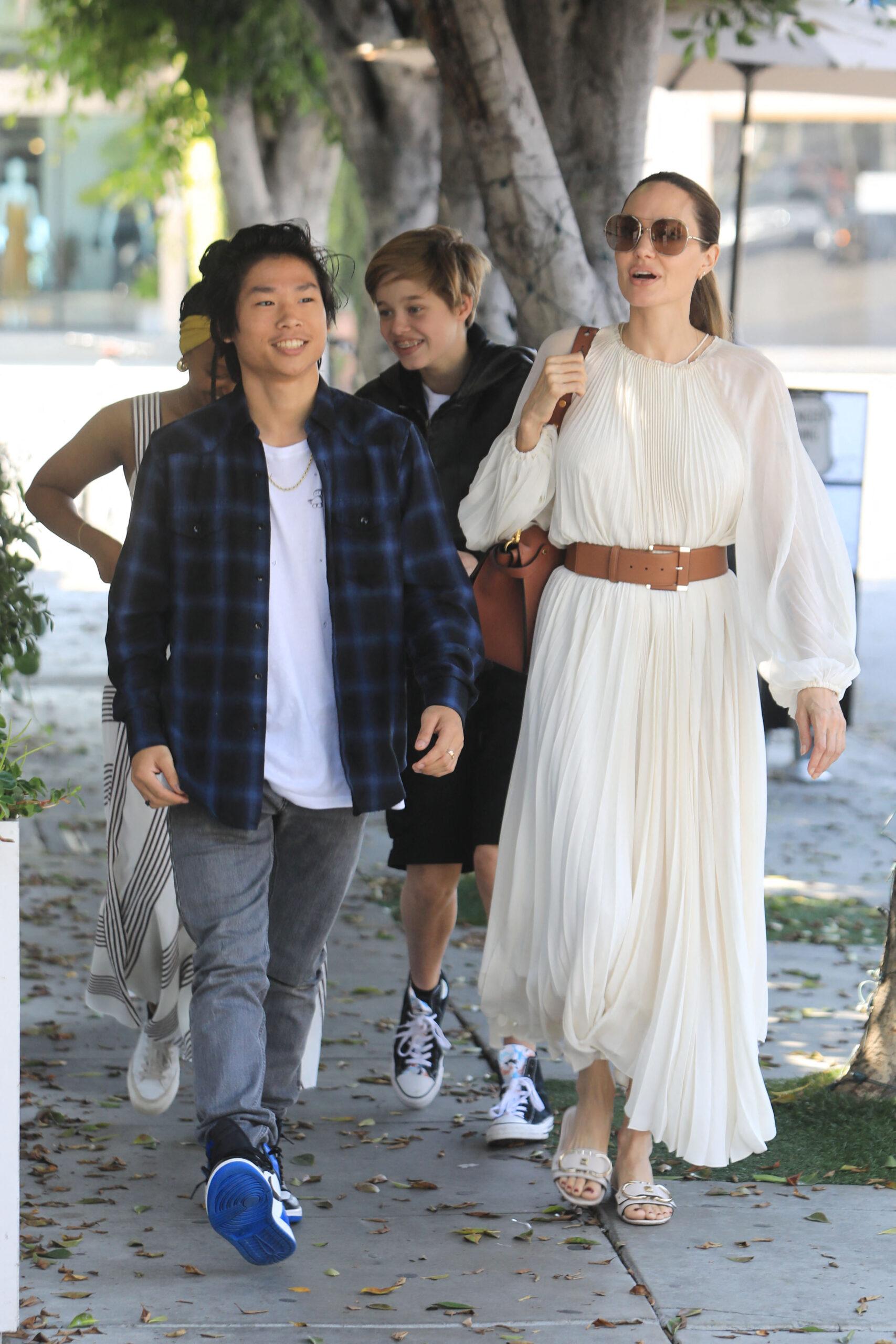 Angelina Jolie out with her 3 kids at Fig and Olive rest in West Hollywood