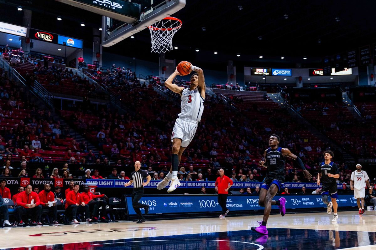 San Diego State guard Elzie Harrington (3) attempts a dunk an NCAA Basketball game between Whittier and San Diego State, Monday December 22, 2025 at Viejas Arena in San Diego, Calif.