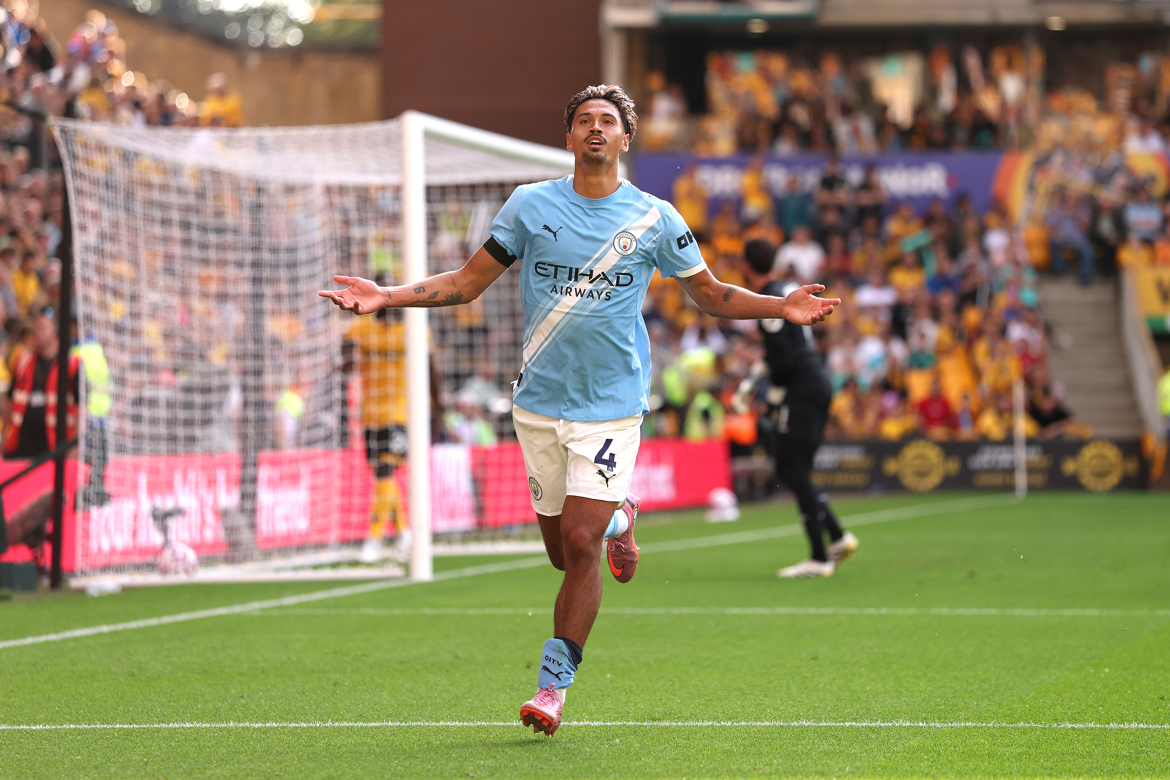 WOLVERHAMPTON, ENGLAND - AUGUST 16: Tijjani Reijnders of Manchester City celebrates scoring his sides second goal during the Premier League match between Wolverhampton Wanderers and Manchester City at Molineux on August 16, 2025 in Wolverhampton, England. (Photo by Alex Pantling/Getty Images)