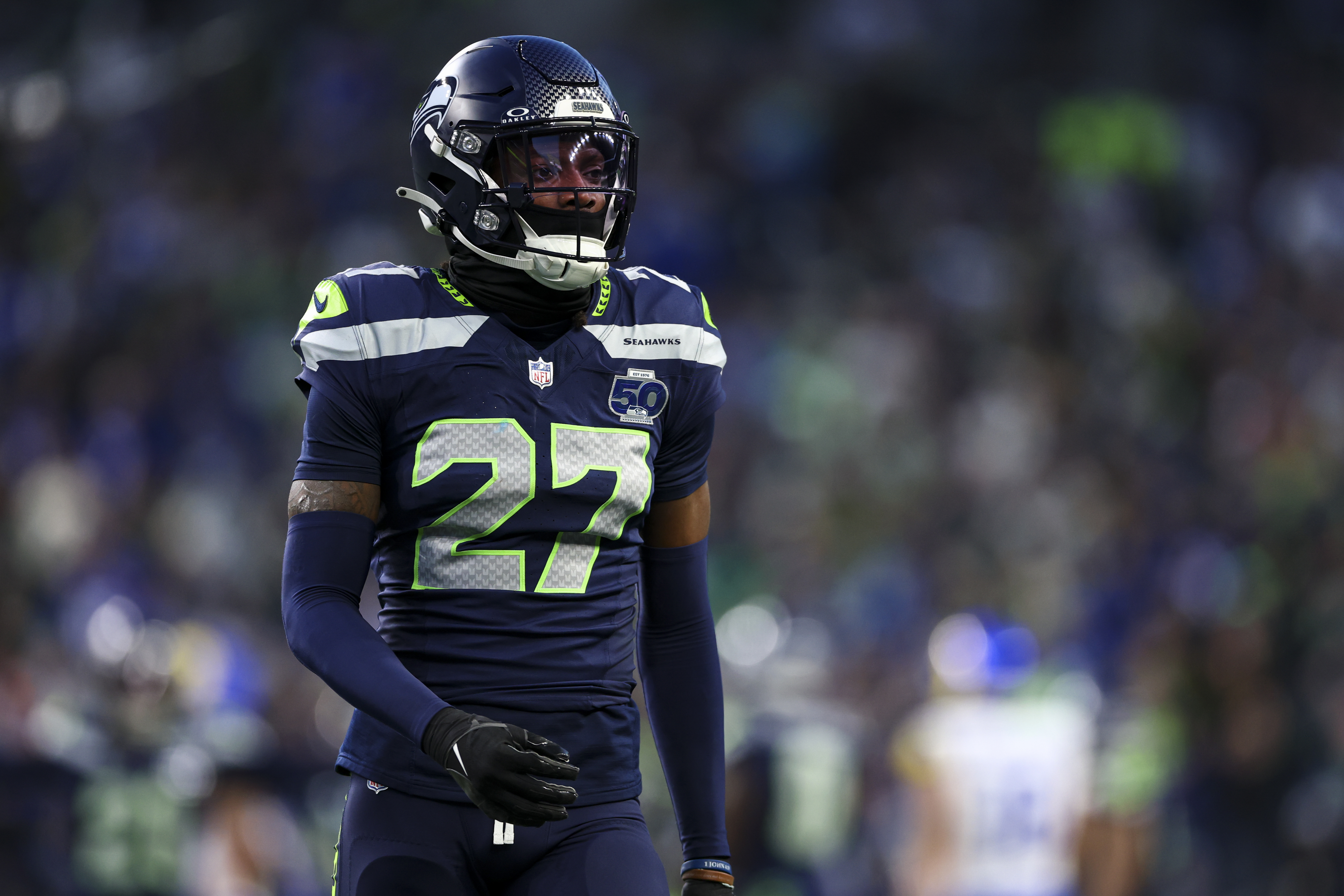 SEATTLE, WASHINGTON - JANUARY 25: Riq Woolen #27 of the Seattle Seahawks stands on the field during the second quarter of the NFC Championship NFL football game against the Los Angeles Rams, at Lumen Field on January 25, 2026 in Seattle, Washington. (Photo by Kevin Sabitus/Getty Images)