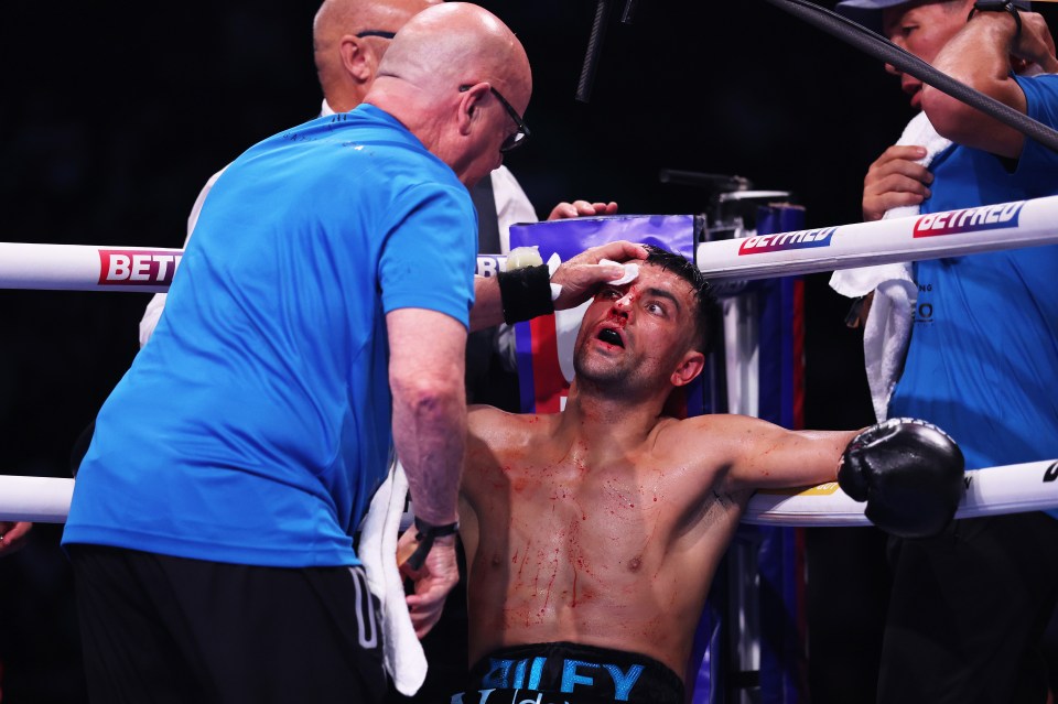 MANCHESTER, ENGLAND - JULY 05: Jack Catterall receives medical attention to a cut on his right eye during his IBF Inter-Continental Welterweight title fight against Harlem Eubank on 'The Warrior Code' fight card at AO Arena on July 05, 2025 in Manchester, England. (Photo by Alex Livesey/Getty Images)