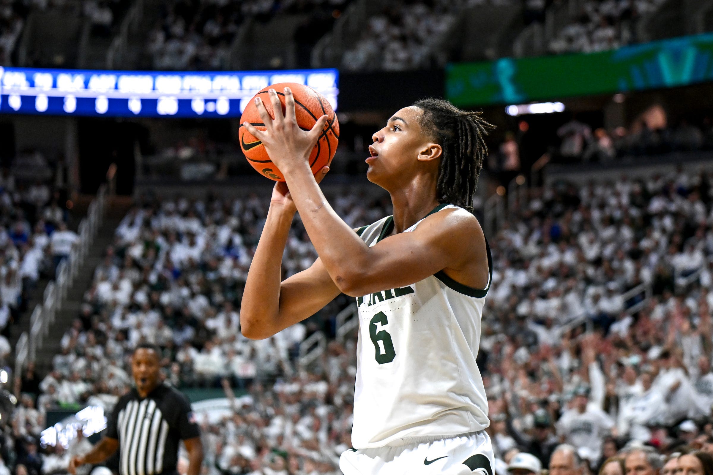 Michigan State's Jordan Scott makes a 3-pointer against Duke during the second half on Saturday, Dec. 6, 2025, at the Breslin Center in East Lansing.