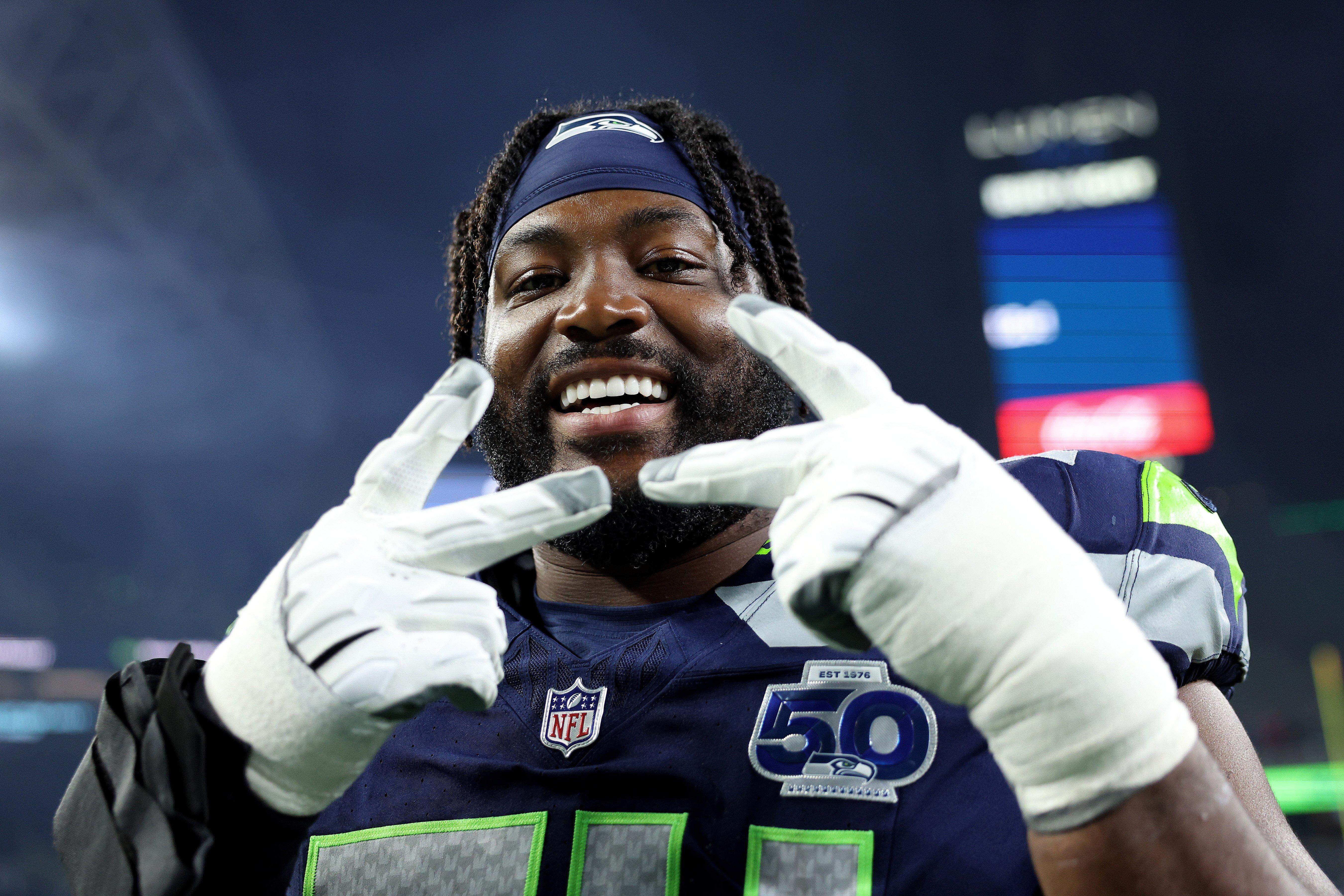 Veteran offensive lineman Josh Jones of the Seahawks reacts after beating his former Houston Texans at Lumen Field on October 20, 2025 in Seattle. (Photo by Steph Chambers/Getty Images)