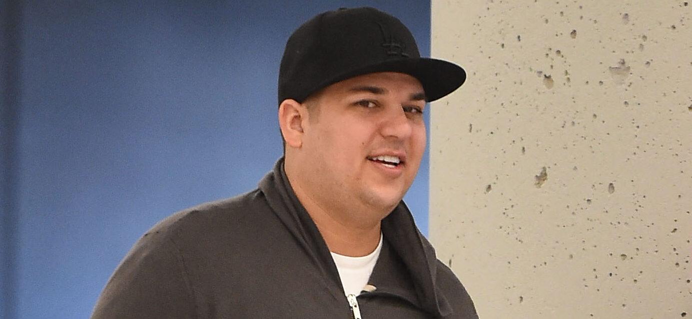 Rob Kardashian and Blac Chyna arrive at JFK airport in NYC.