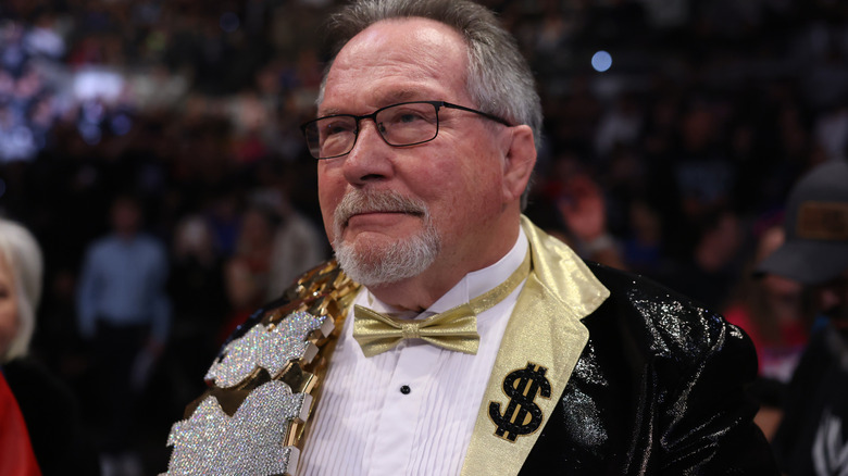 Ted DiBiase Sr. stands in his Million Dollar Man attire at ringside