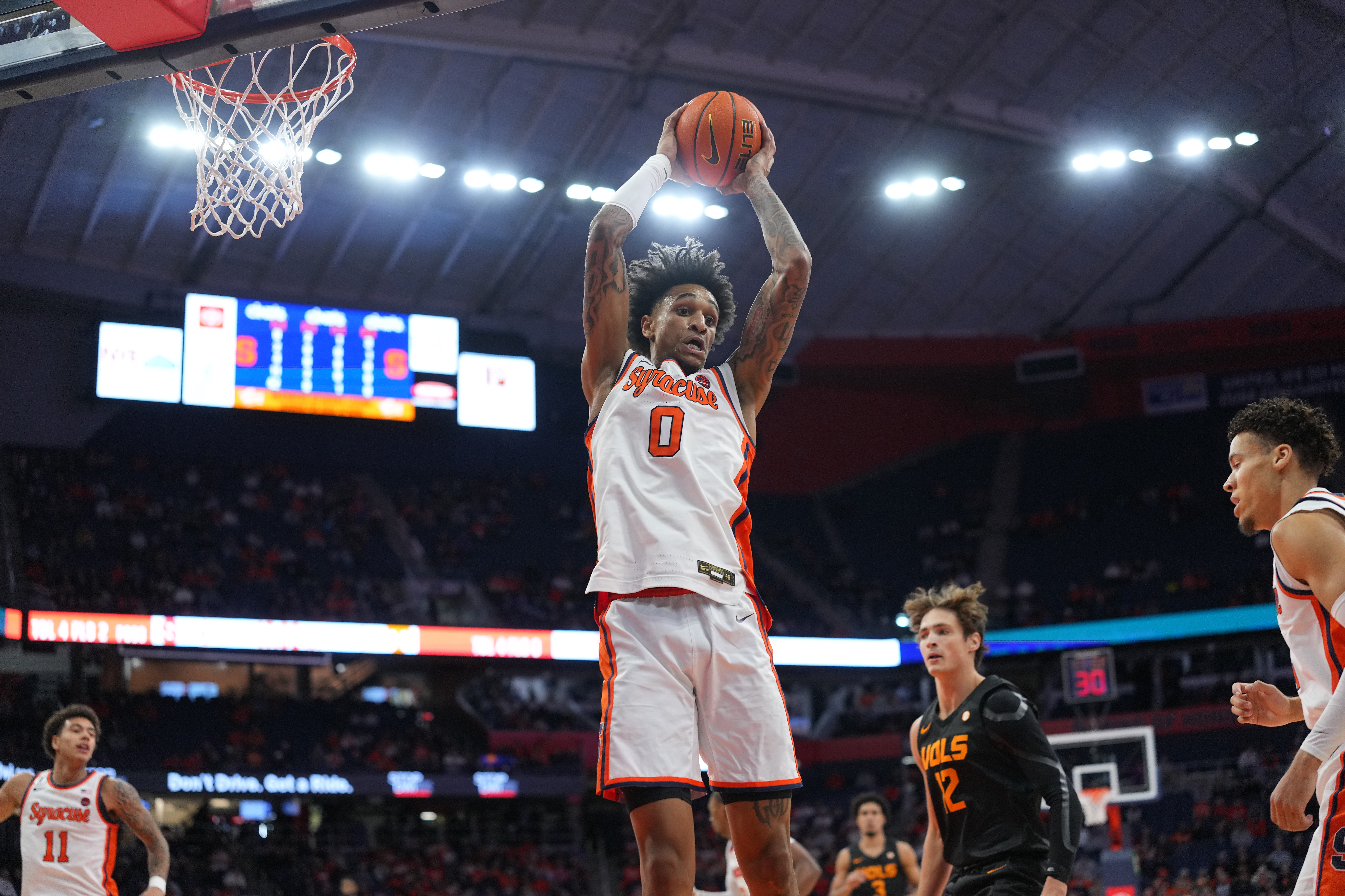 SYRACUSE, NY - DECEMBER 02: Syracuse Orange Forward Sadiq White Jr. (0) grabs a rebound during the first half of the College Basketball game between the Tennessee Volunteers and the Syracuse Orange on December 2, 2025, at the JMA Wireless Dome in Syracuse, NY. (Photo by Gregory Fisher/Icon Sportswire via Getty Images)