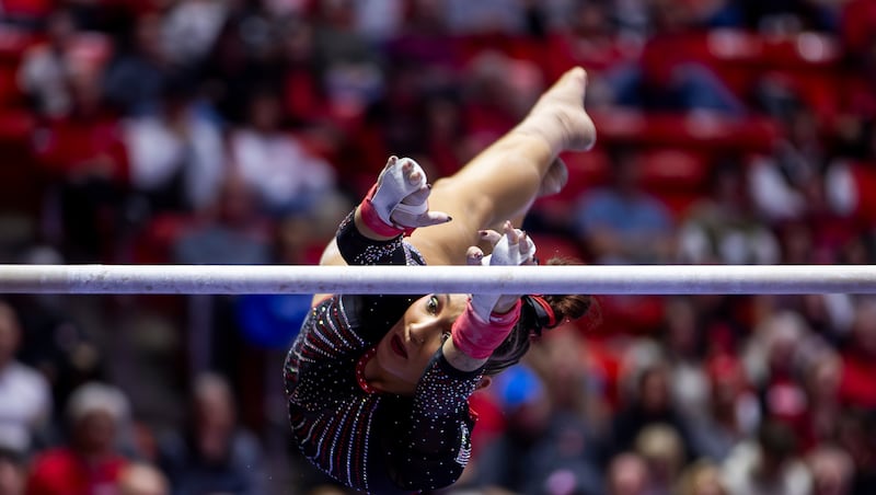 Utah&rsquo;s Makenna Smith competes on the uneven bars during the tri-meet between the Utah Red Rocks, Iowa Hawkeyes and the Minnesota Golden Gophers at the Huntsman Center in Salt Lake City on Friday, Jan. 2, 2026.