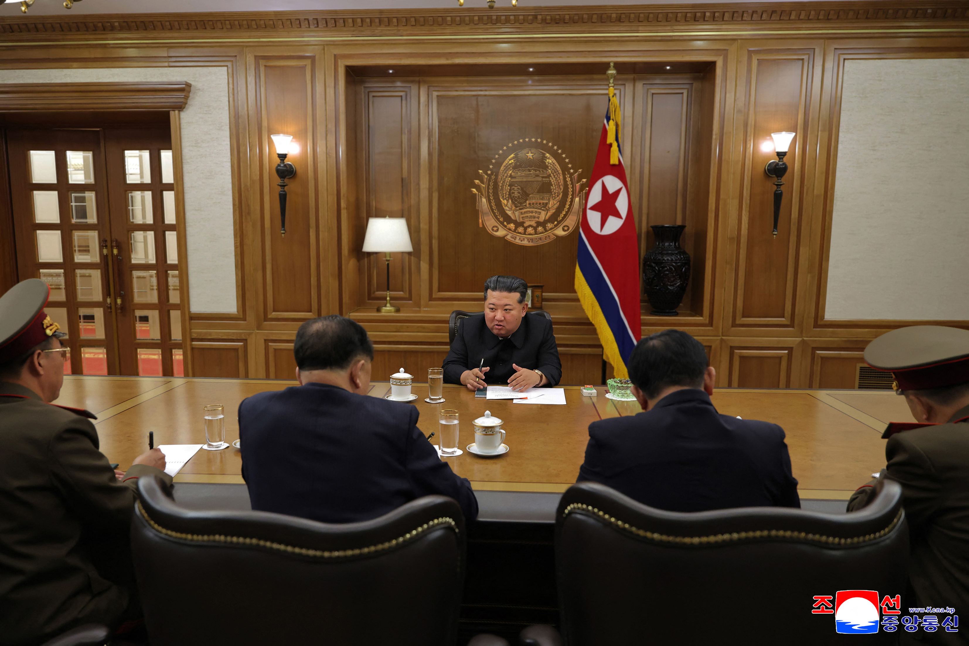 This picture taken on September 26, 2025 and released from North Korea's official Korean Central News Agency (KCNA) on September 27, 2025 shows North Korean leader Kim Jong Un attending a consultation meeting on nuclear materials and nuclear weapons production with scientists and engineers from the Nuclear Weapons Institute and nuclear-related fields, at an undisclosed location in North Korea.