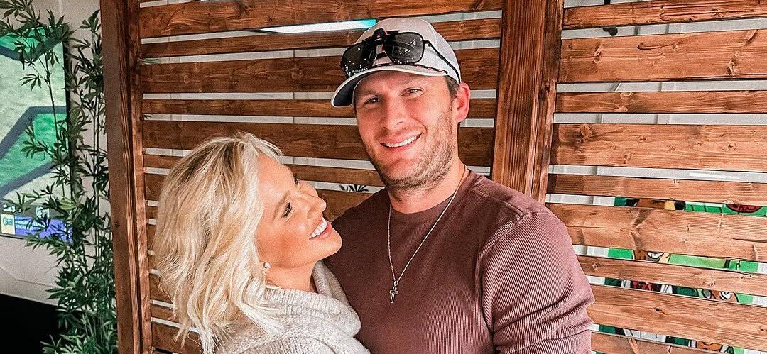 Savannah Chrisley and Robert Shiver posing together.
