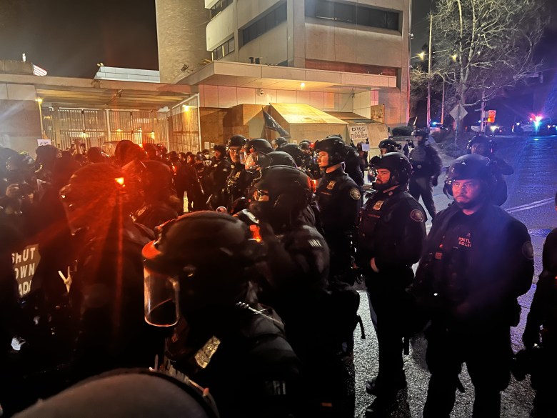 Local Portland police cleared protesters from the road in front of the South Waterfront ICE facility in Portland, Oregon. Photo by Shane Burley.