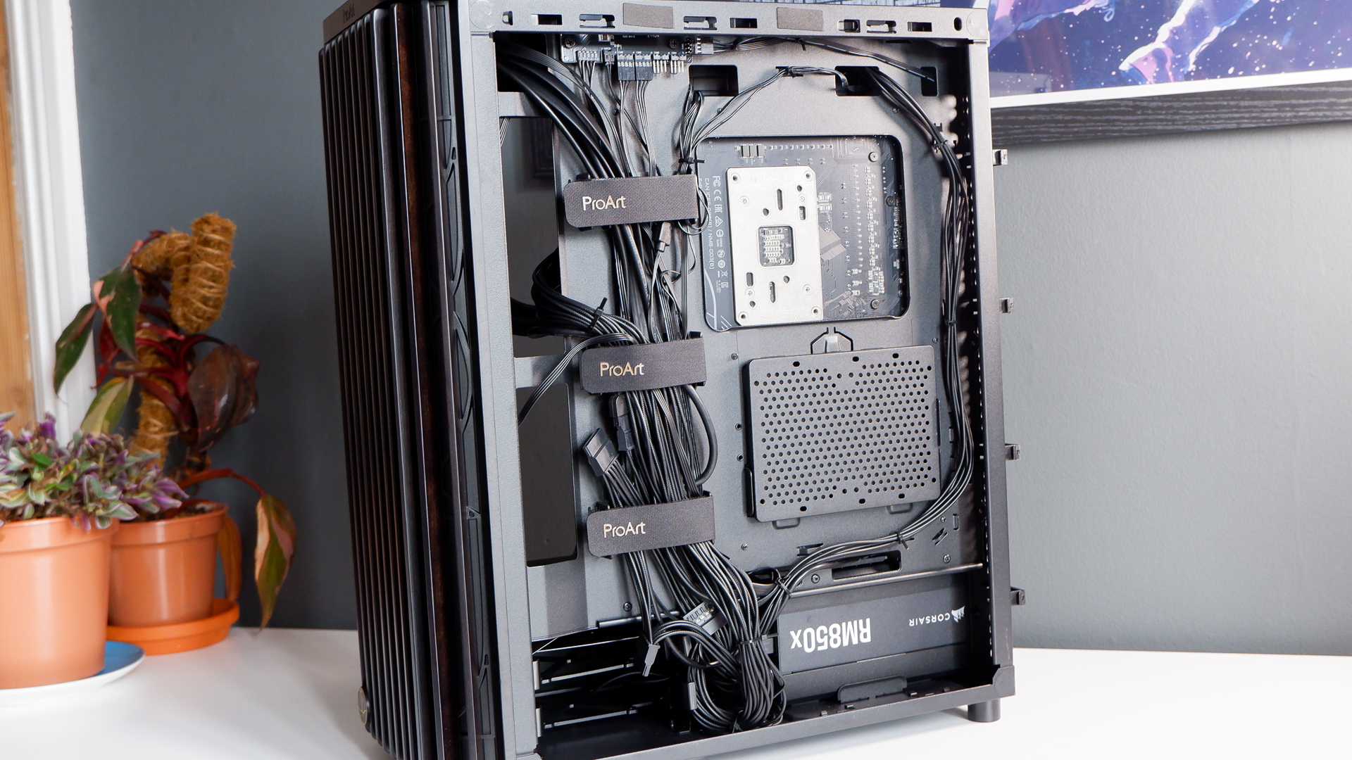 A gaming PC in the process of being built, using Radeon and Ryzen components and an Asus Pro Art PA401 PC case.