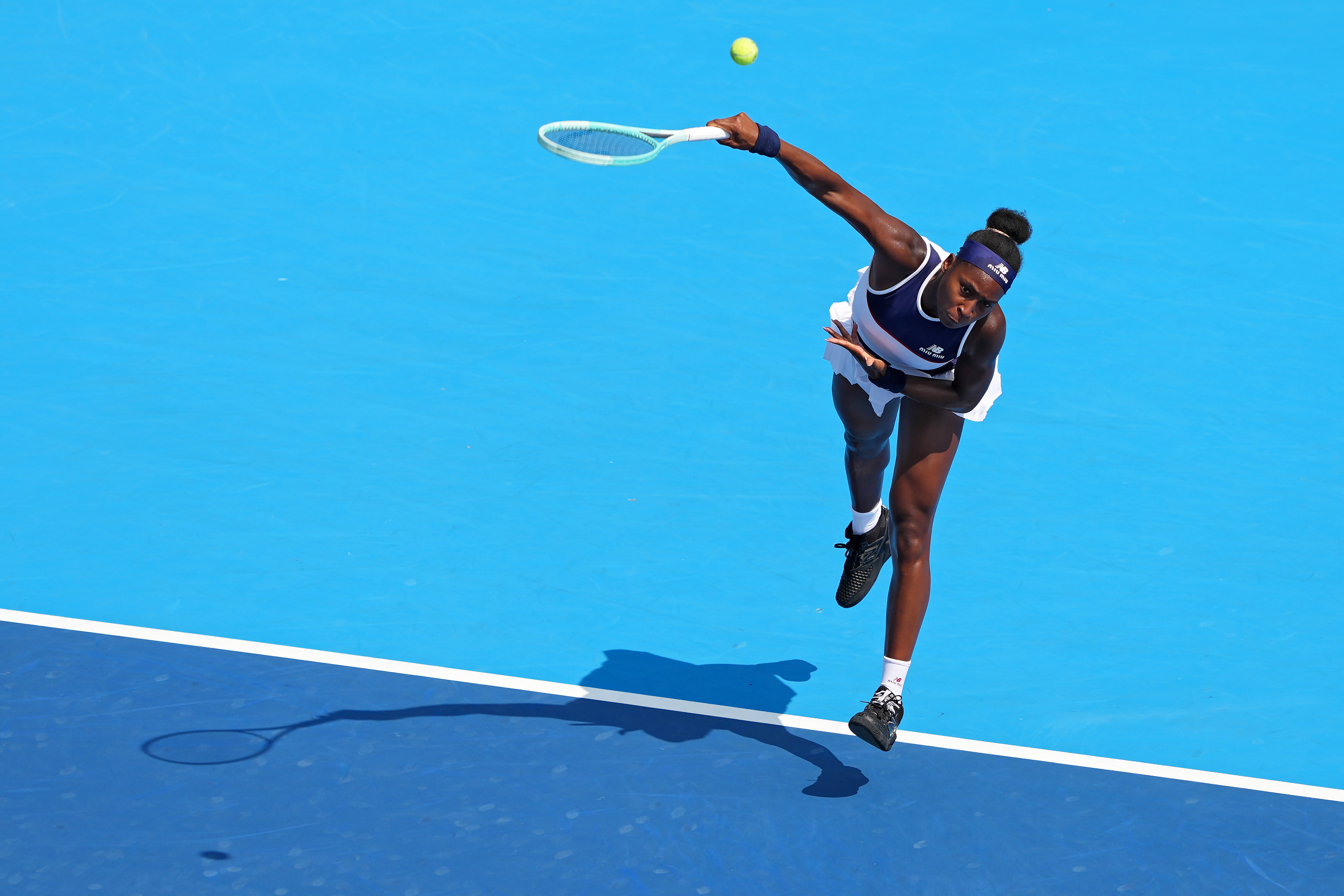 MASON, OHIO - AUGUST 14: Coco Gauff of the United States serves during the match against Lucia Bronzetti of Italy during Day 8 of the Cincinnati Open at the Lindner Family Tennis Center on August 14, 2025 in Mason, Ohio. (Photo by Dylan Buell/Getty Images)