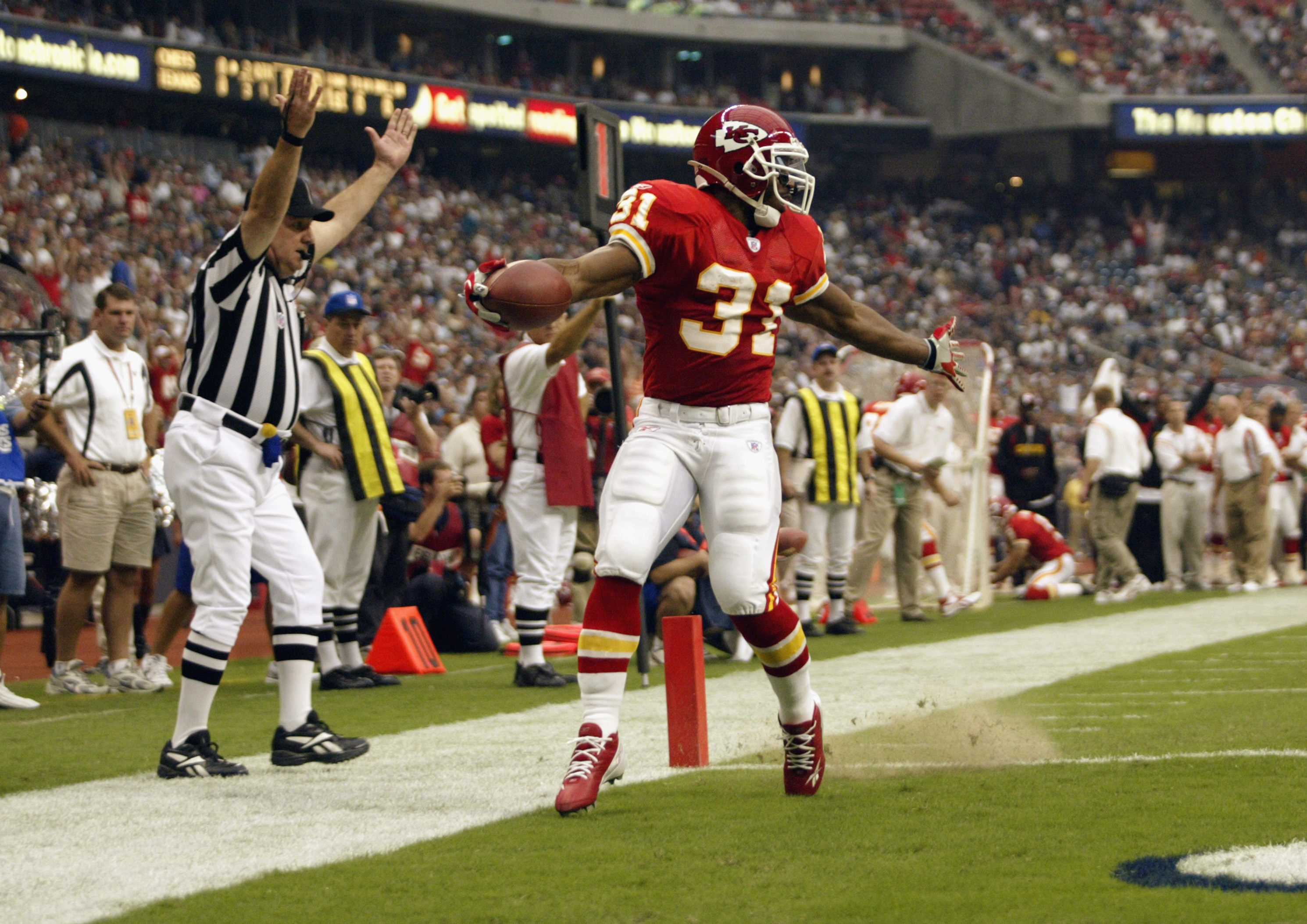 HOUSTON - SEPTEMBER 21: Running back Priest Holmes #31 of the Kansas City Chiefs scores a touchdown against the Houston Texans during the game at Reliant Stadium on September 21, 2003 in Houston, Texas. The Chiefs defeated the Texans 42-14. (Photo by Ronald Martinez/Getty Images)
