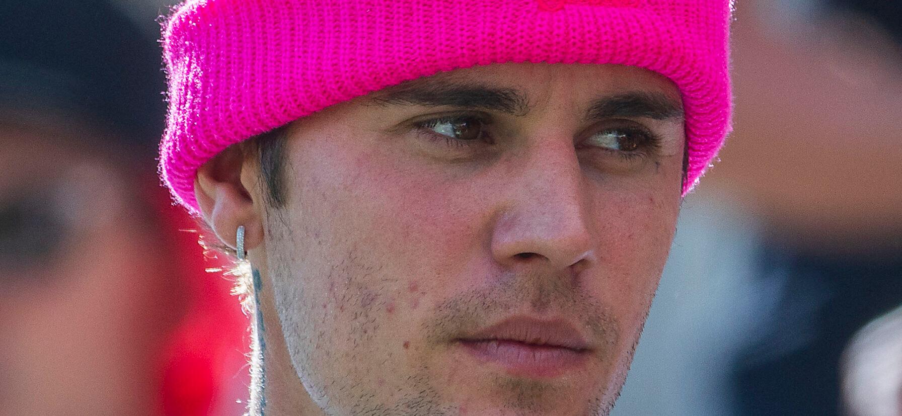 Justin Bieber wearing pink beanie