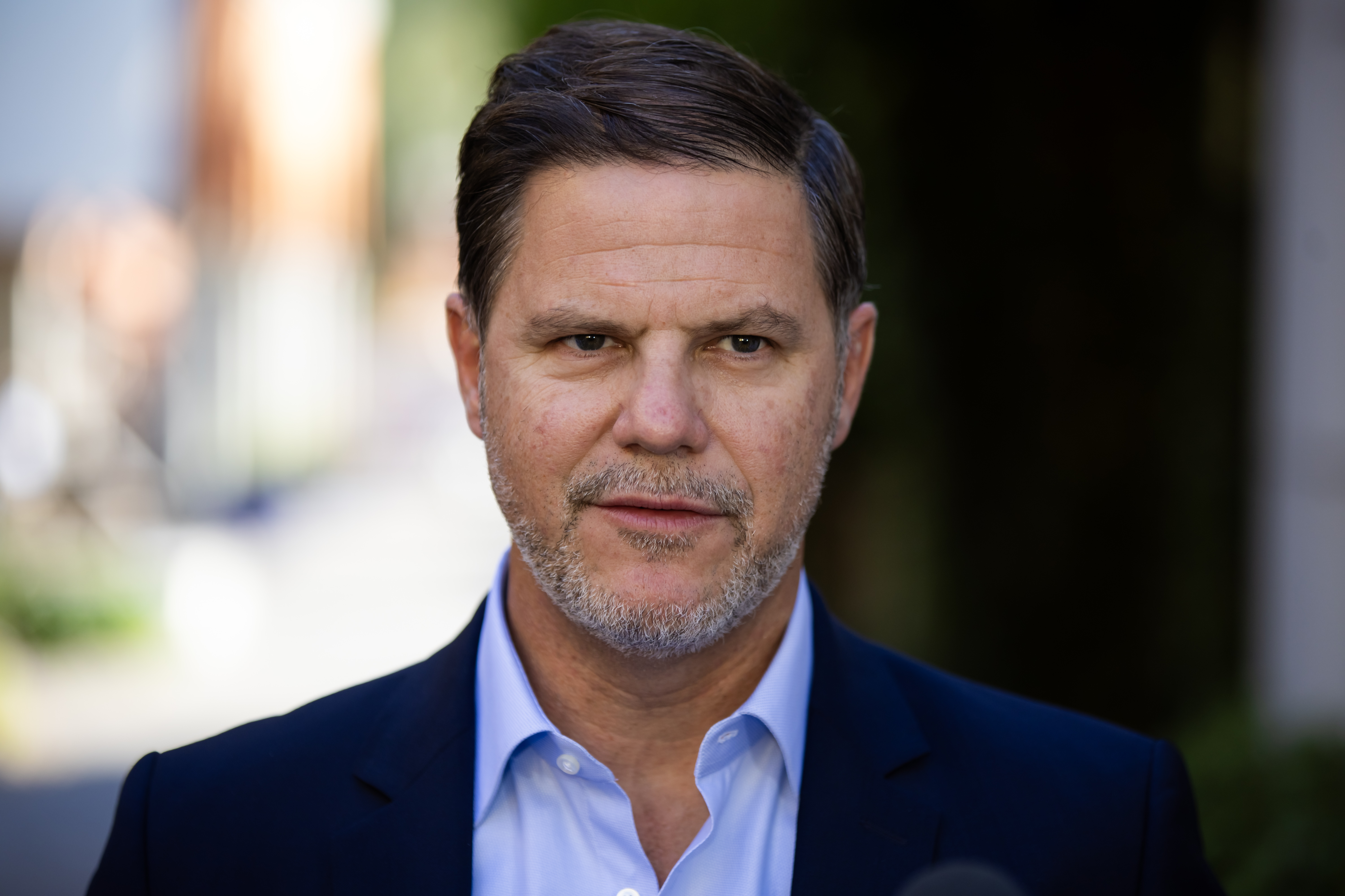 A photo of Ross Atkins, who got contacts but still looks like a nerd