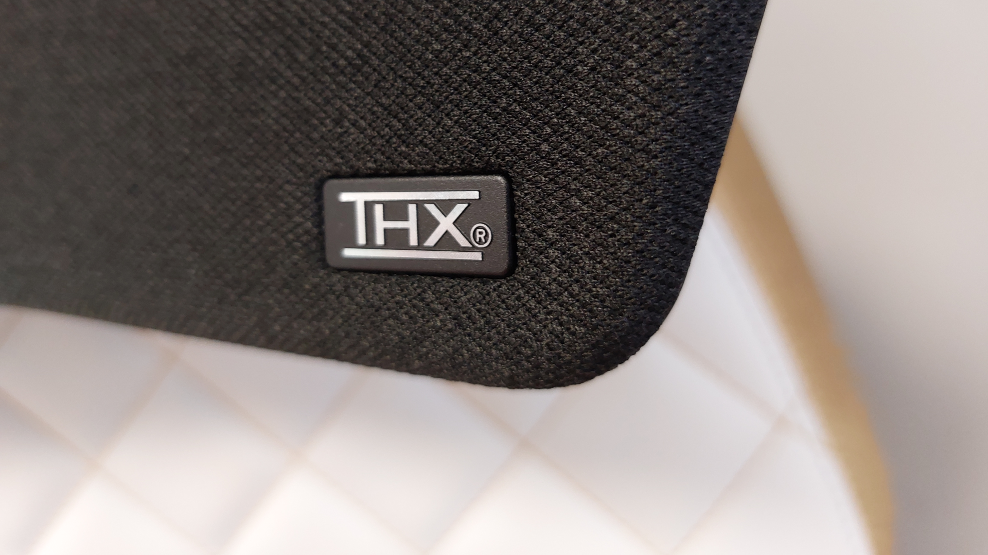 The Razer Clio headrest speaker mounted to a Backforce chair.