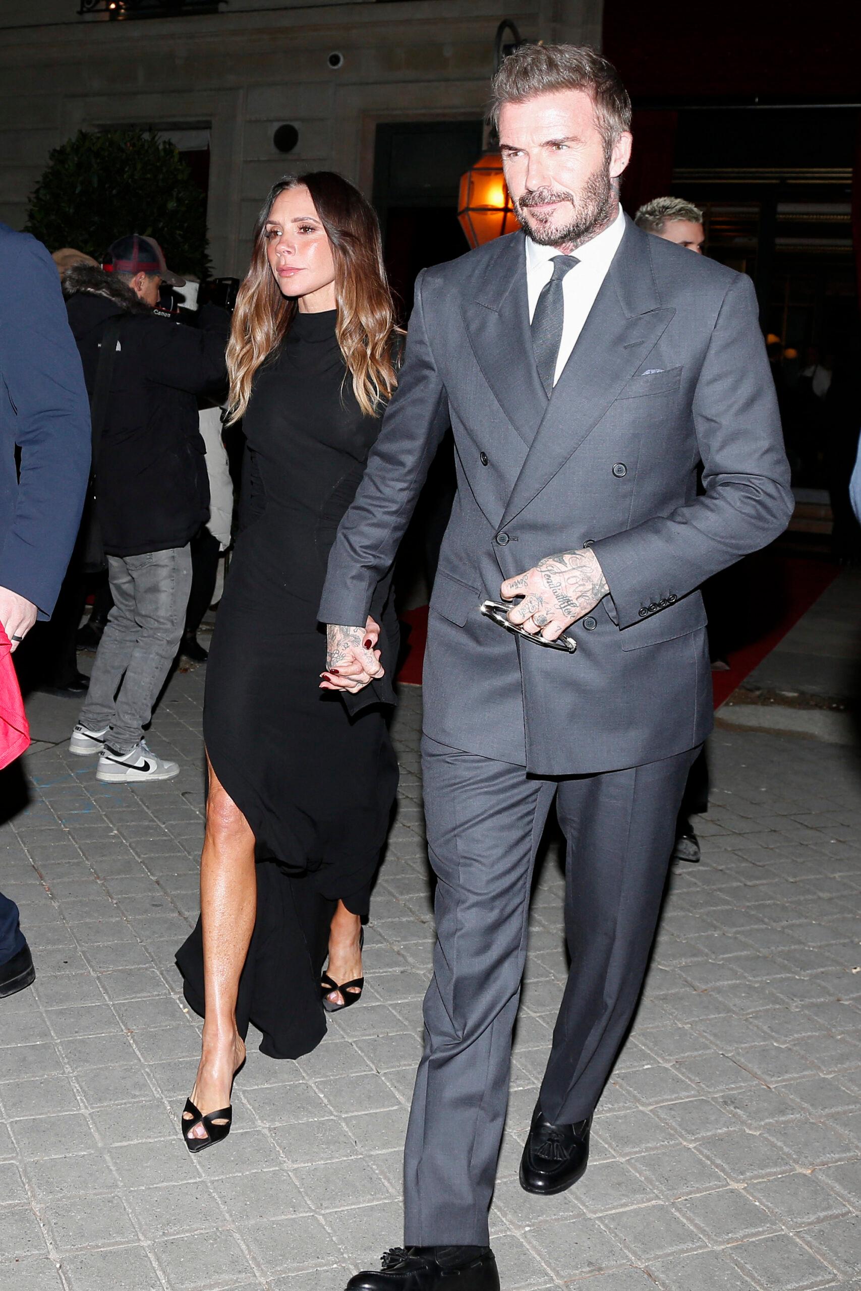 David Beckham and Victoria Beckham are seen leaving their hotel during Paris Fashion Week