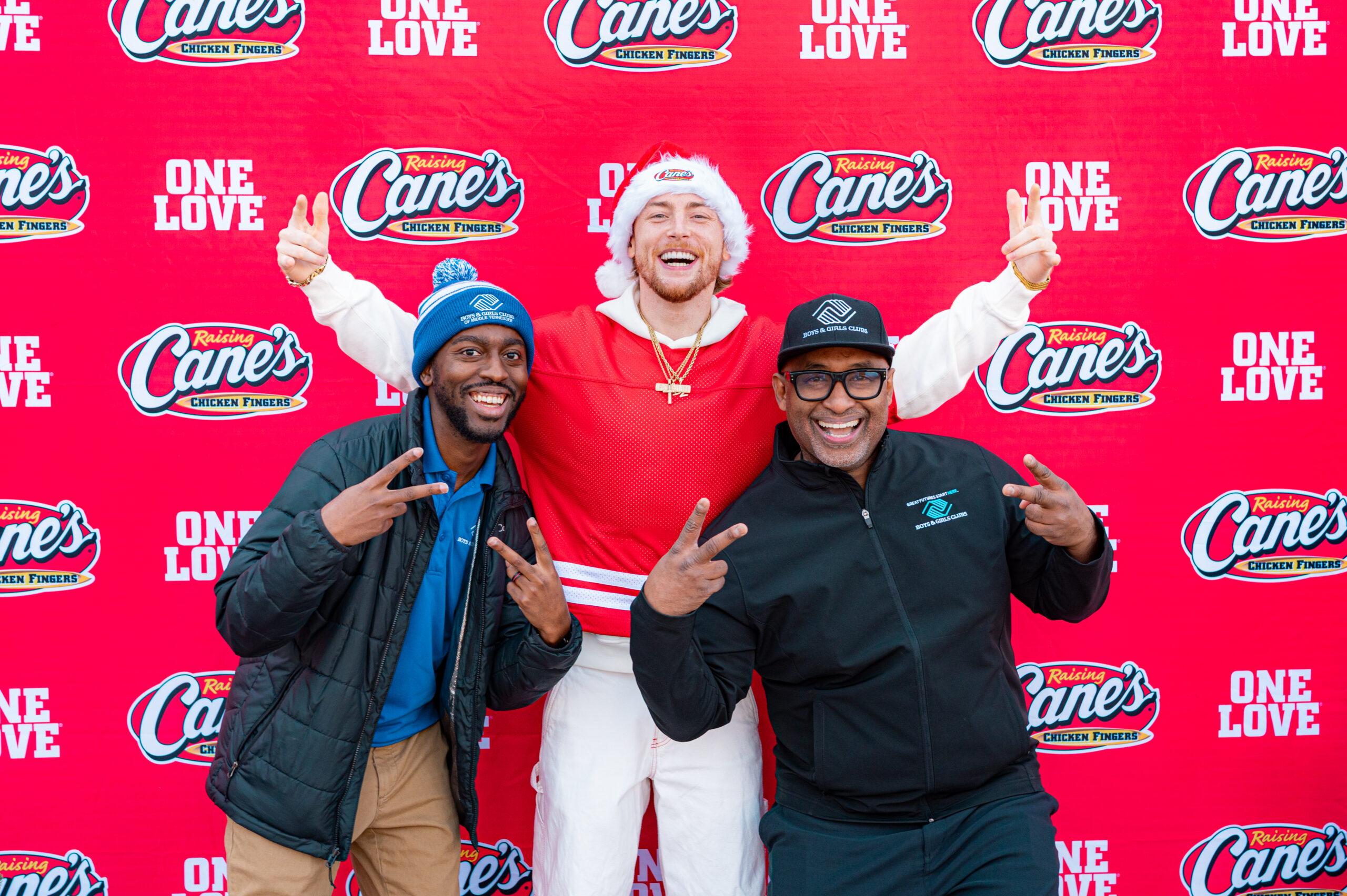 Bailey Zimmerman at Raising Cane's event for bike giveaway