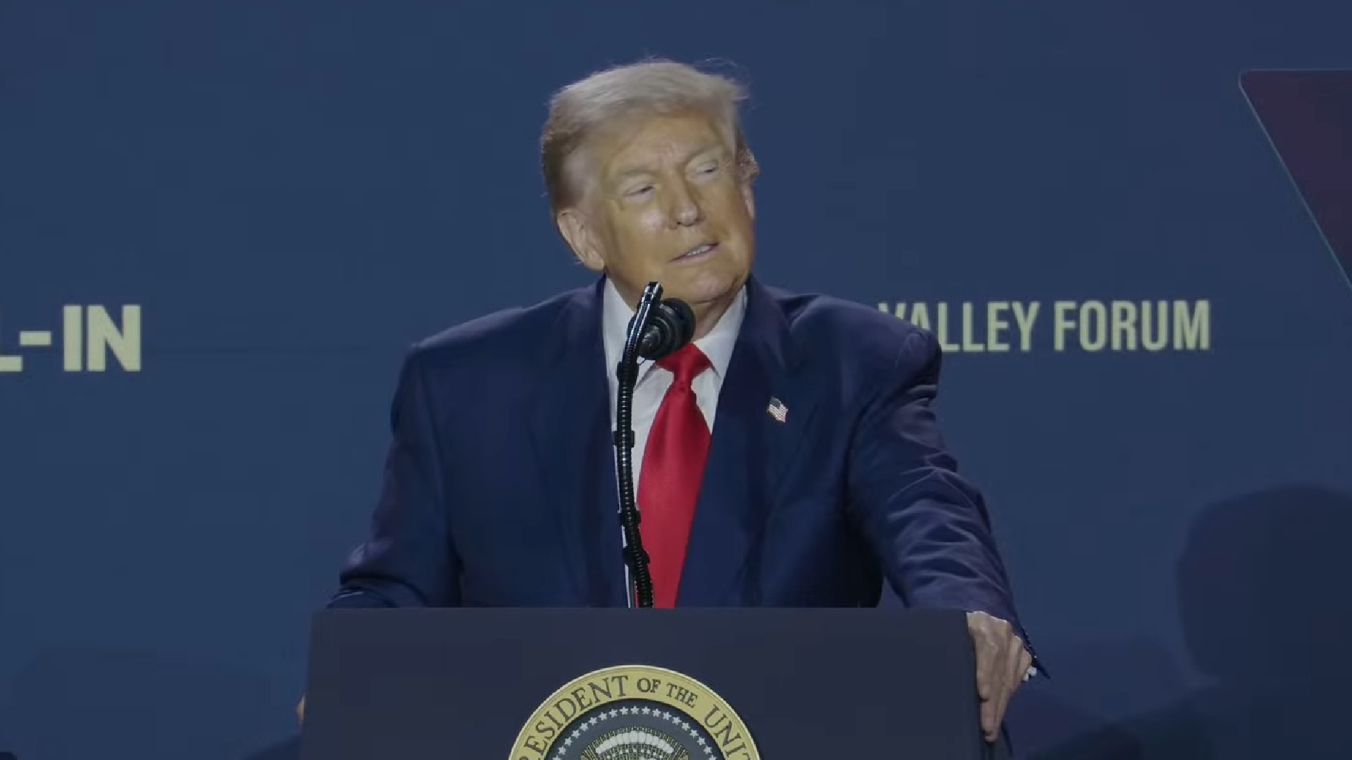A still from a YouTube video of President Trump speaking at an AI summit in Washington DC
