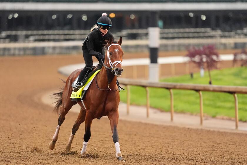 Kentucky Derby entrant Renegade works out at Churchill Downs on Tuesday in Louisville, Ky.
