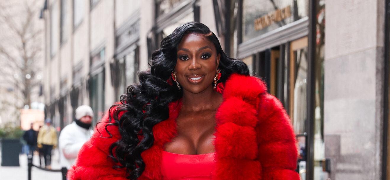 Wendy Osefo posing outside for a picture.